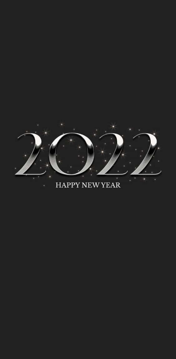 新年快樂 桌布 壁紙 — 閃亮銀色2022文字，搭配閃爍星星在黑色背景上慶祝新年。