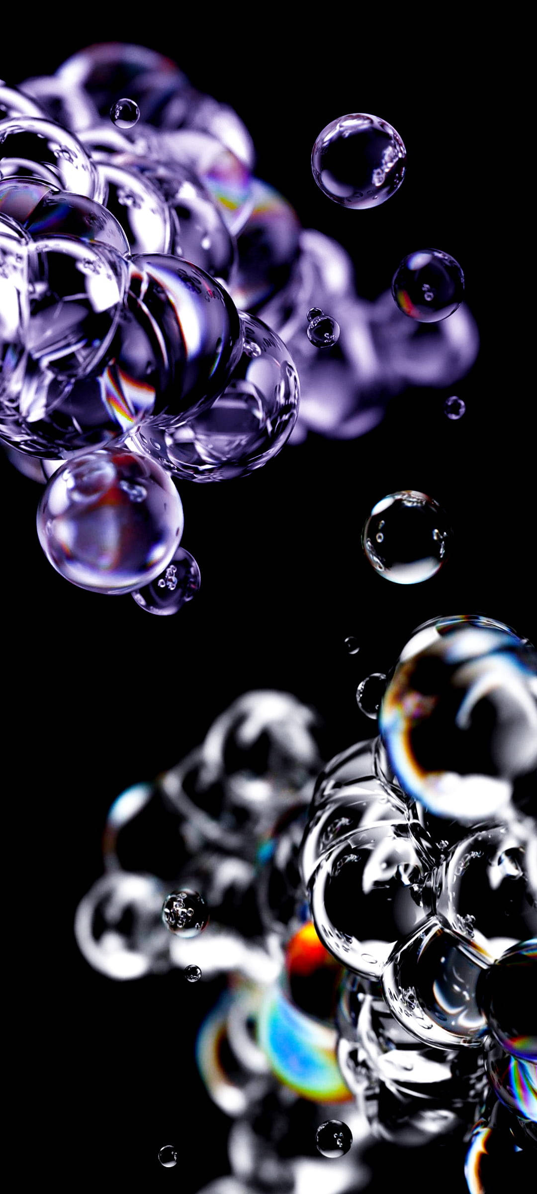 Bubbles 桌布 壁紙 — 閃爍的半透明氣泡漂浮在深黑色背景上，反射出鮮豔的彩虹色調。
