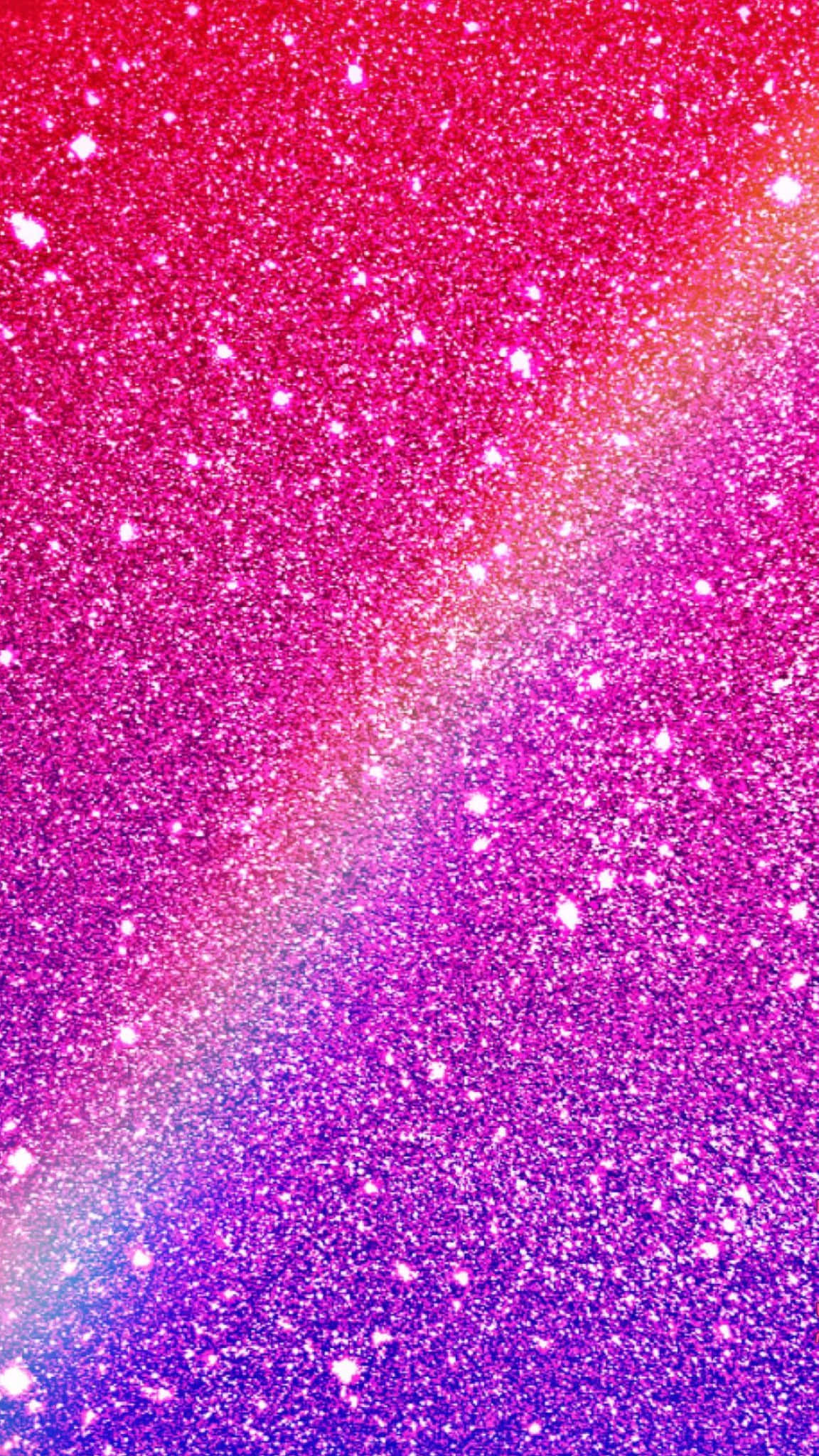 Rainbow Glitter 桌布 壁紙 — 閃爍的宇宙星雲以鮮豔的粉紅色、紫色和藍色色調旋轉，閃爍的星星散佈各處。