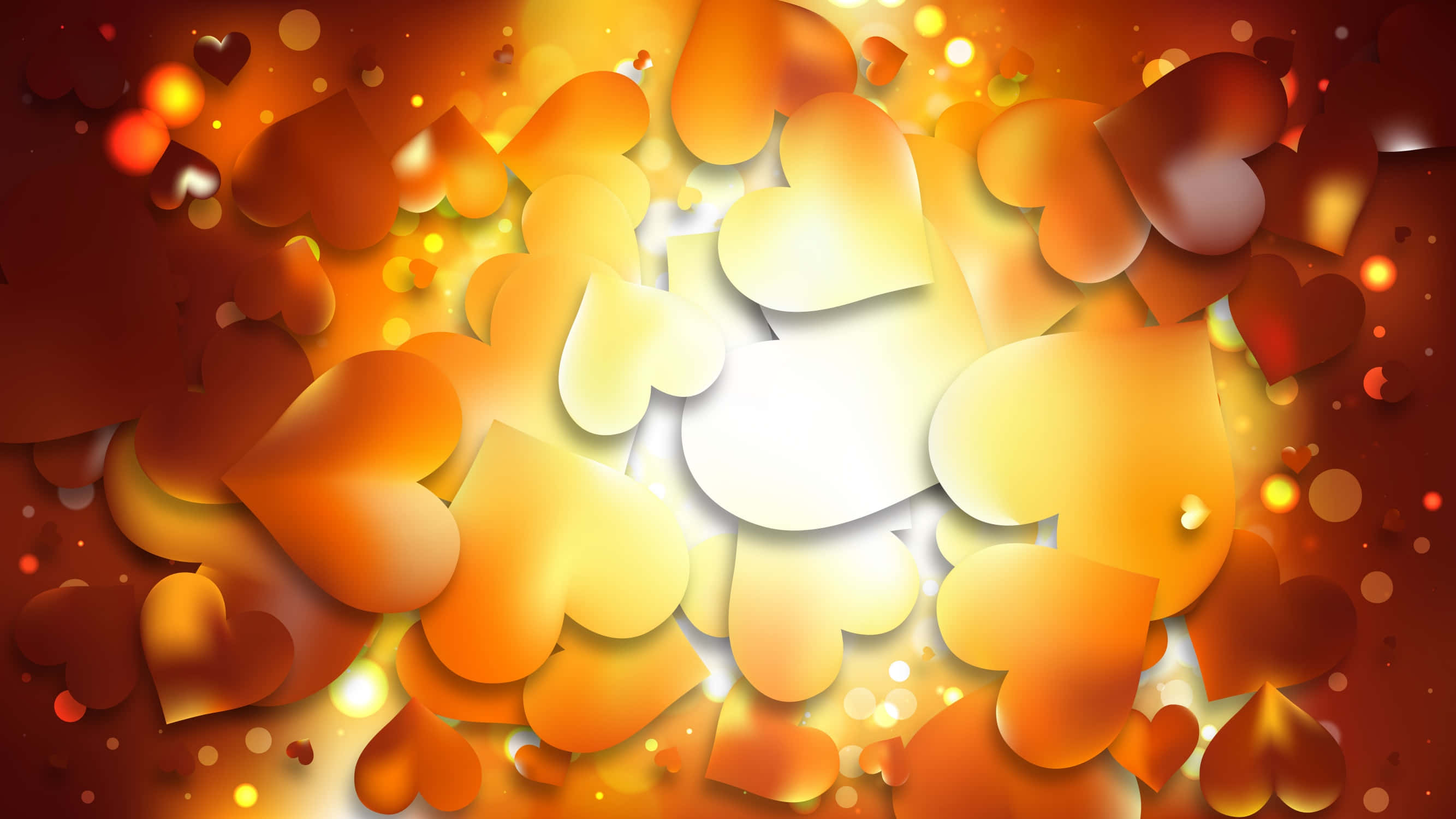 Orange Heart 桌布 壁紙 — 閃爍的橙色和黃色心形光芒四射，搭配柔和的散景燈光，營造出溫暖浪漫的氛圍。