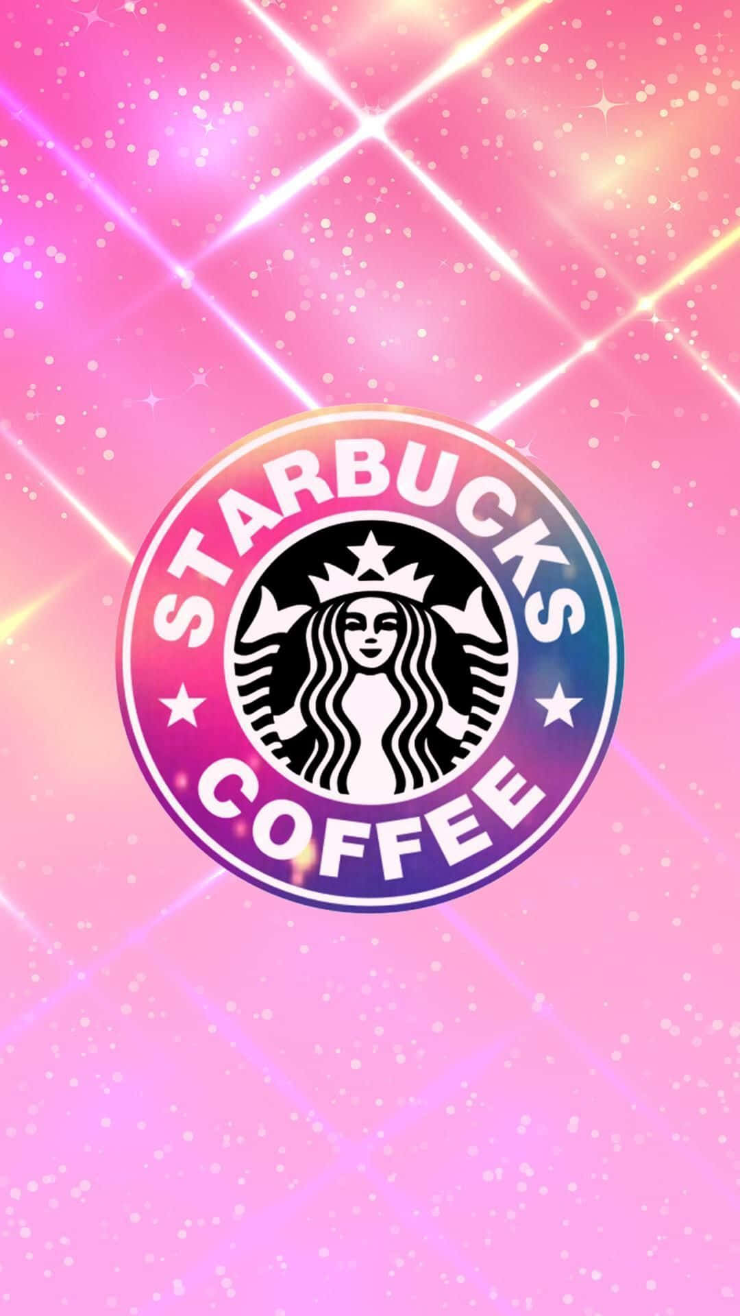 Aesthetic Starbucks 桌布 壁紙 — 閃爍的粉紅和紫色漸變背景，中央有發光的Starbucks標誌和放射光線。