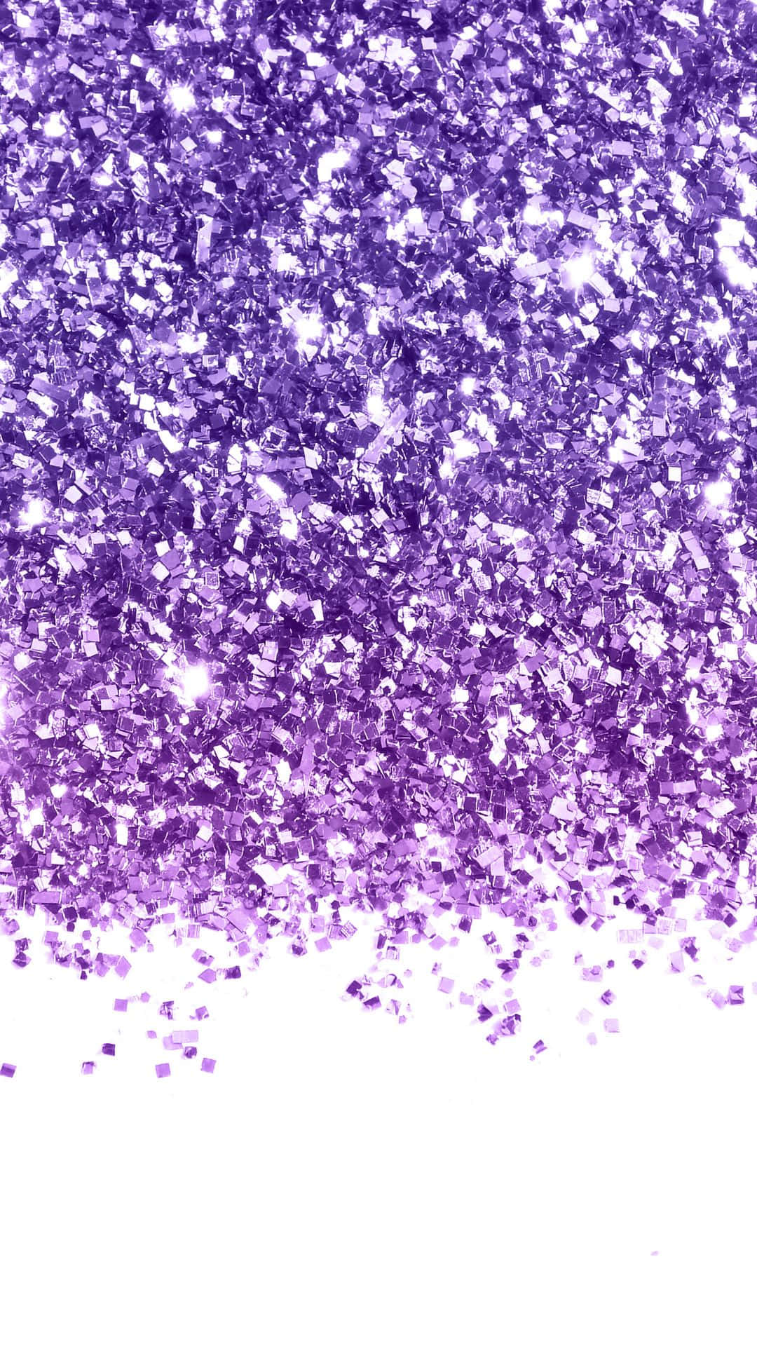 Purple Sparkle 桌布 壁紙 — 閃爍的紫色亮粉粒子在純白背景上沿對角線傾瀉而下。