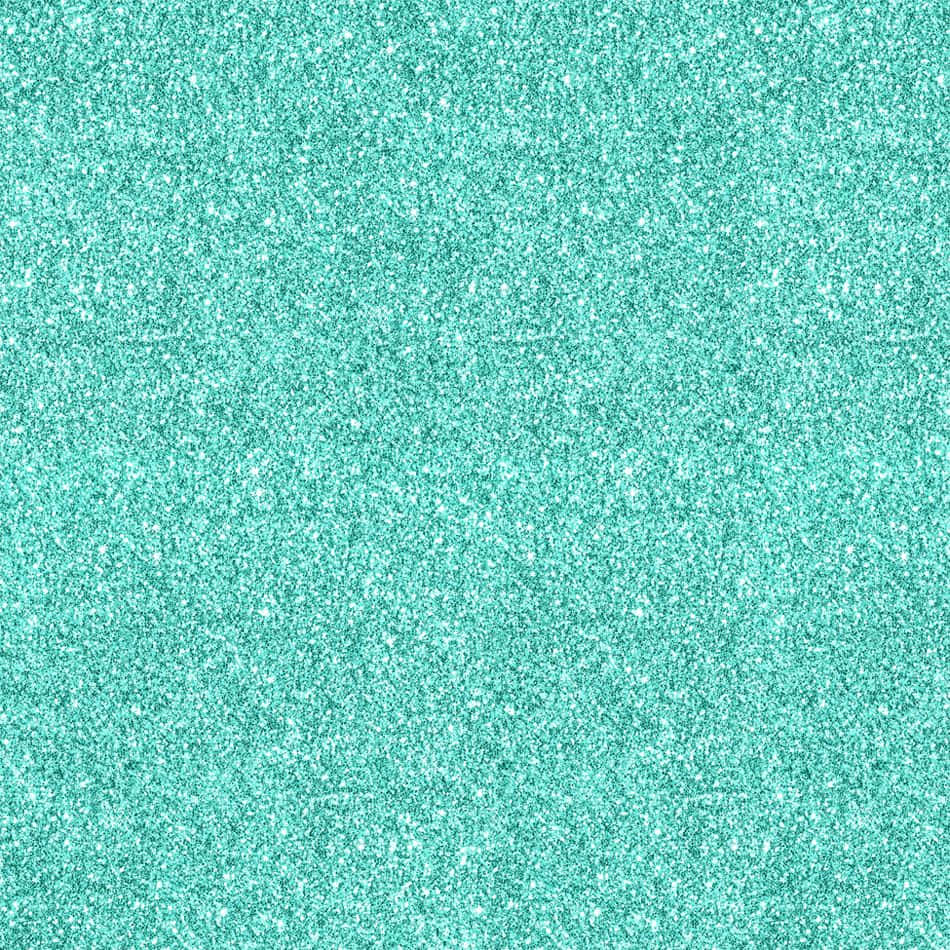 Teal Glitter 桌布 壁紙 — 閃爍的綠松石閃粉紋理，帶有散落的白色斑點，營造出閃閃發光的抽象表面。