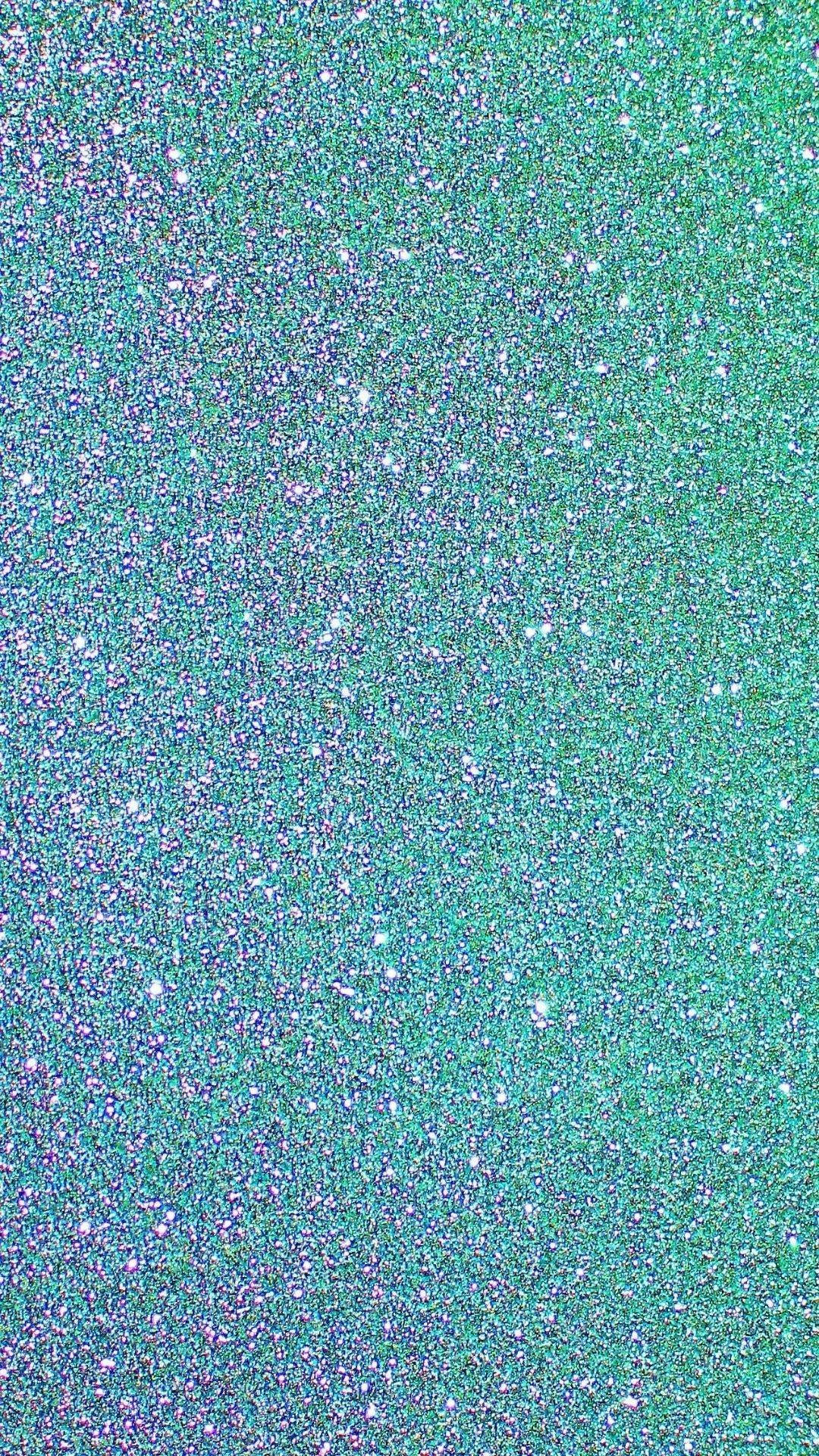 Cyan 桌布 壁紙 — 閃爍的藍綠色和紫色亮粉紋理，整個表面帶有閃爍的顆粒。