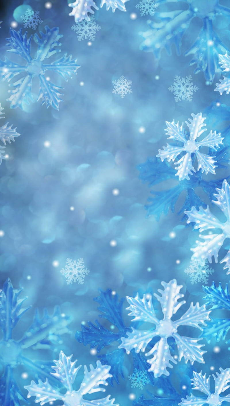 帶有散景背景和閃爍光線的藍色雪花 — 雪花 GIF 壁紙