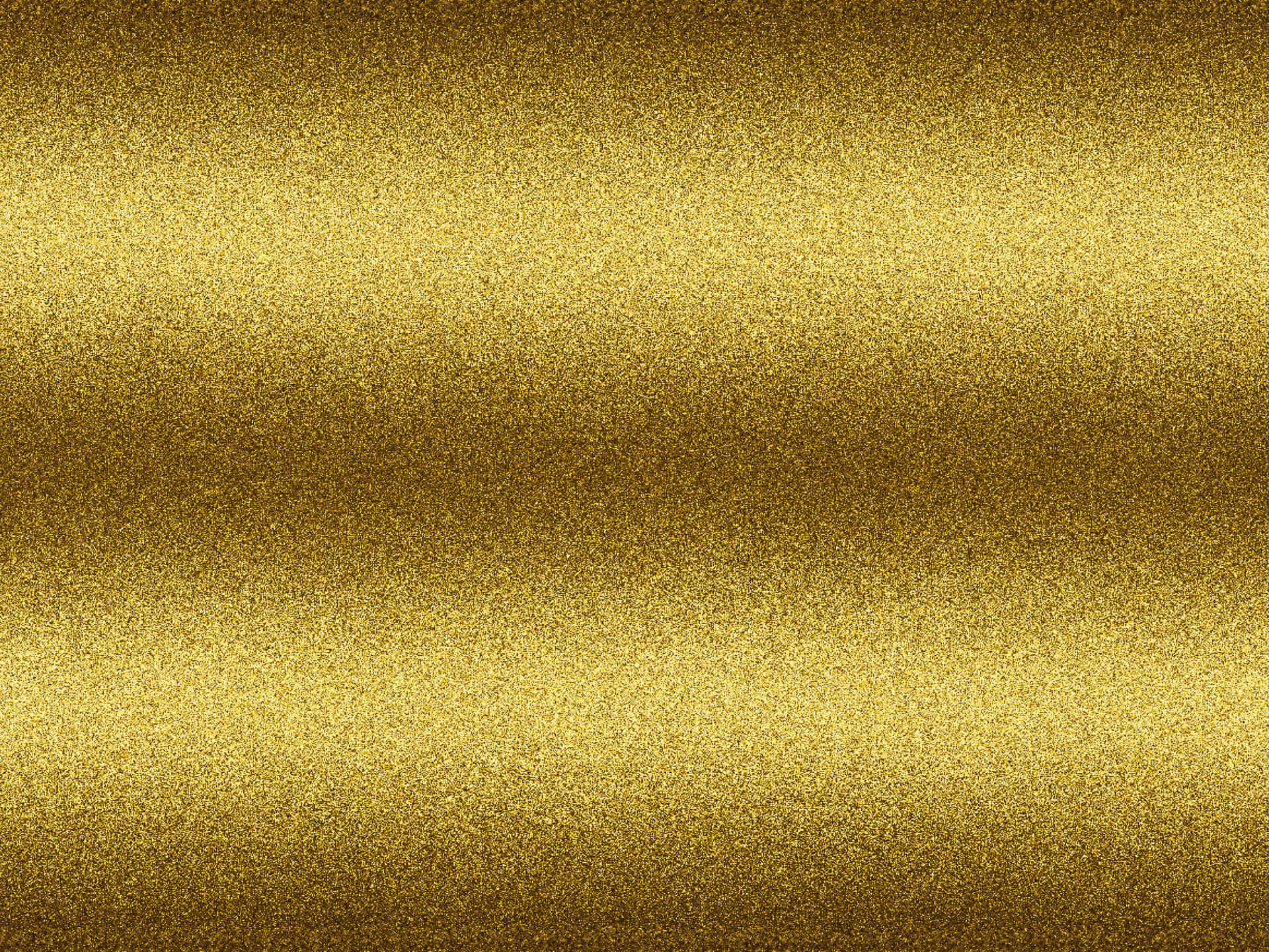 Metallic Gold 桌布 壁紙 — 閃爍的金色閃粉紋理，帶有柔和水平漸變和閃爍粒子。