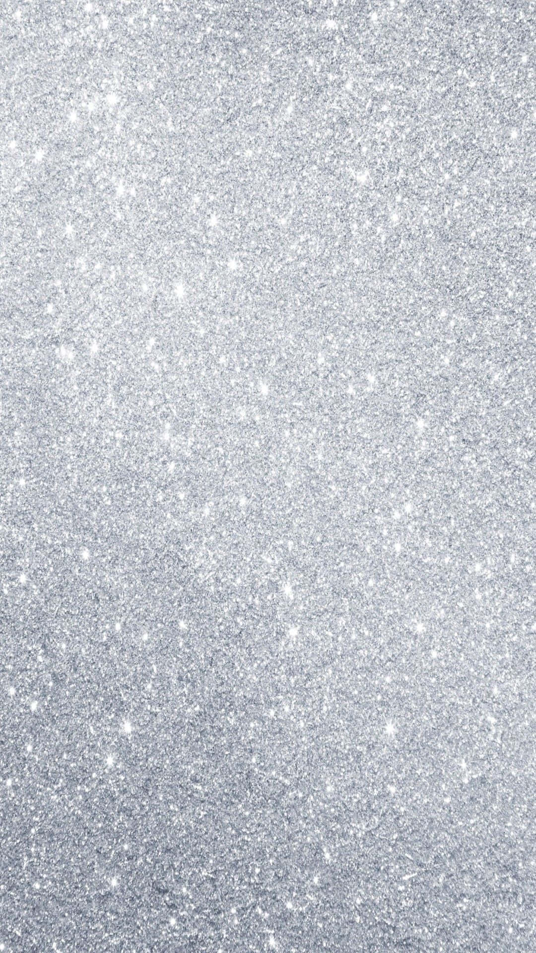 White Glitter 桌布 壁紙 — 閃爍的銀色亮片紋理，帶有閃閃發光的顆粒，在表面上捕捉光線。