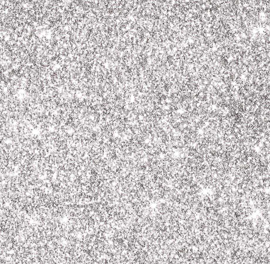 Silver Glitter 桌布 壁紙 — 閃爍的銀色亮片紋理，表面散落著星星形狀閃閃發光。