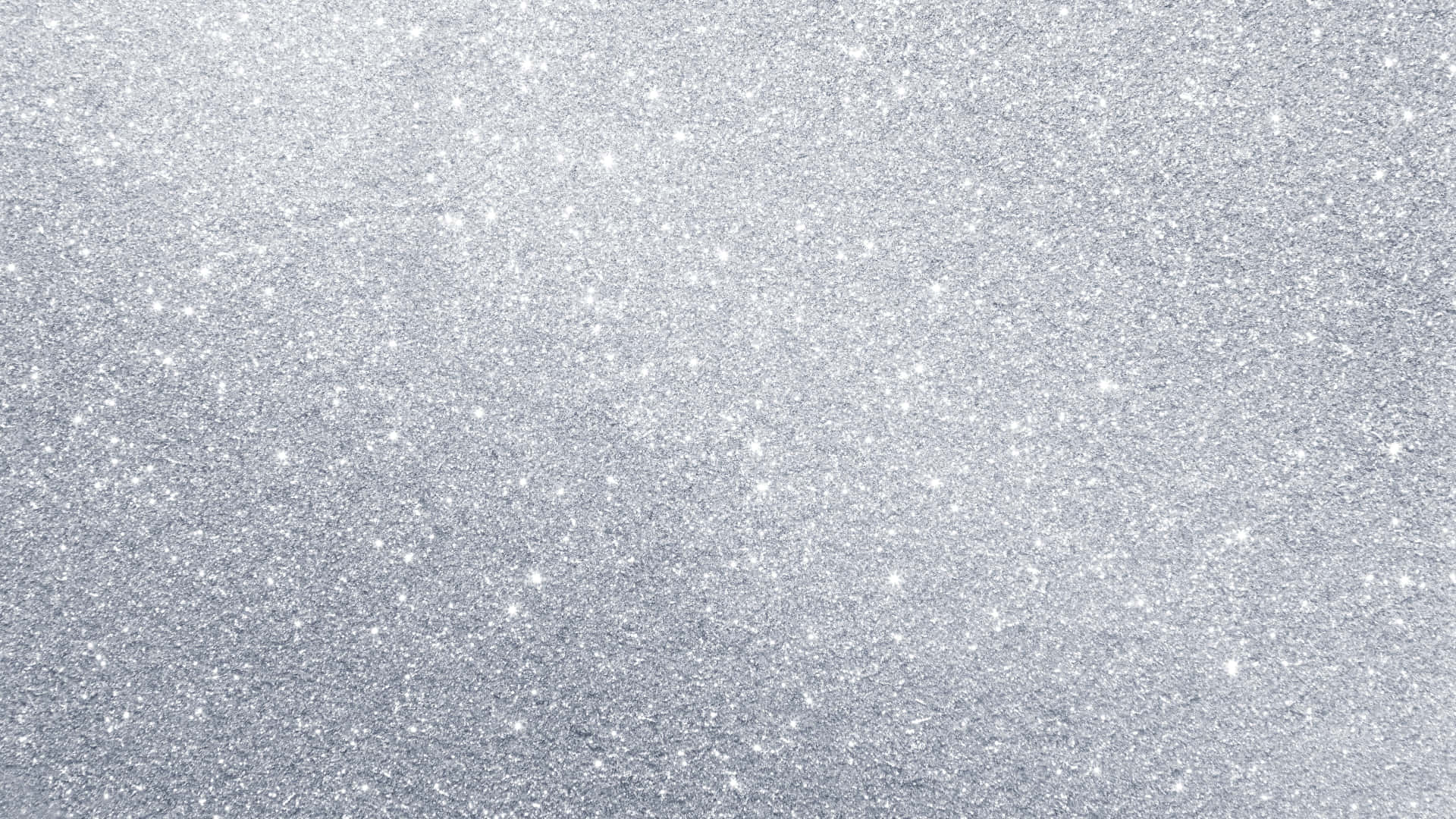 White Glitter 桌布 壁紙 — 閃爍的銀色亮粉紋理，帶有在光滑表面上捕捉光線的閃亮顆粒。
