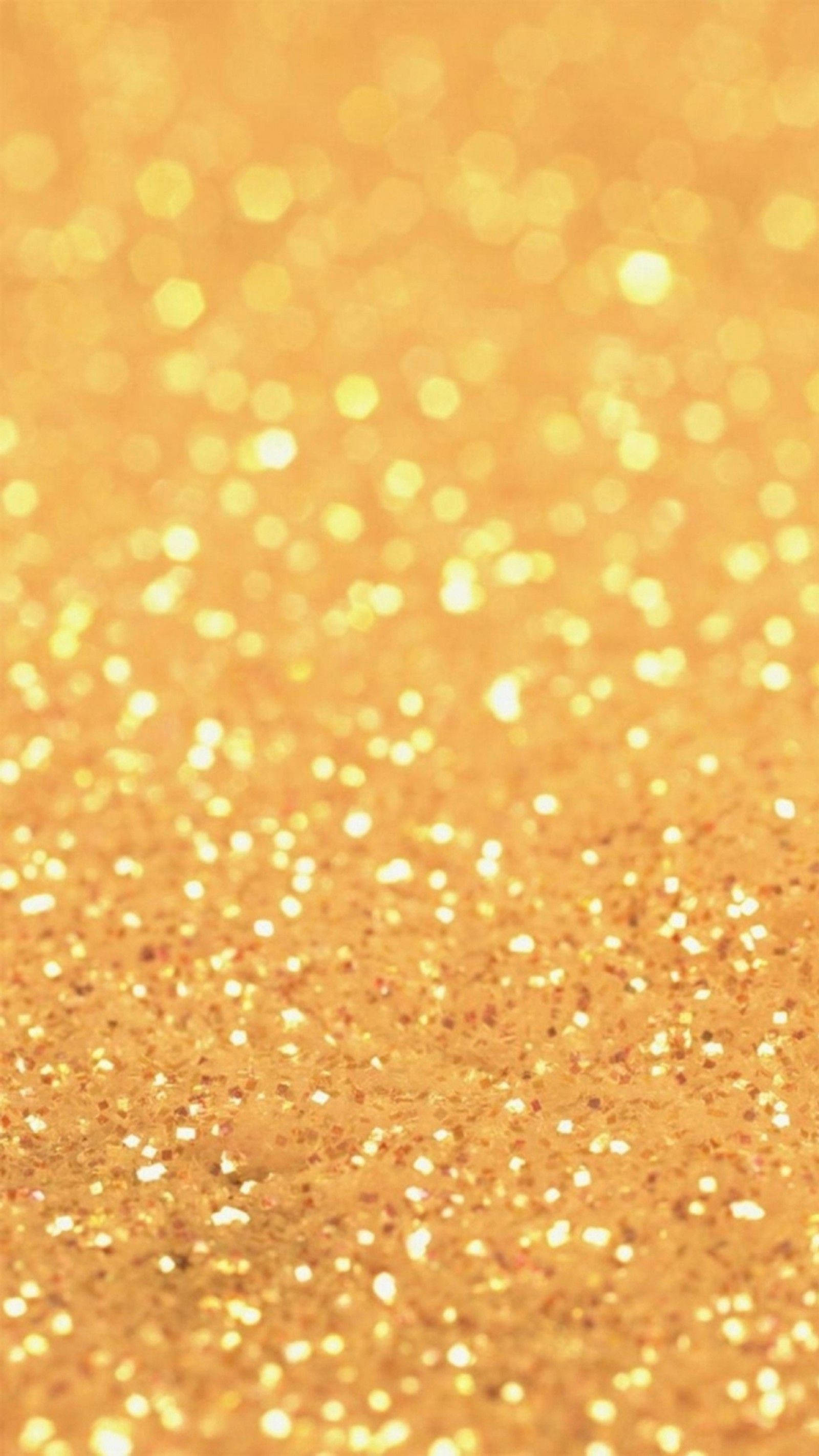 Gold Glitter 桌布 壁紙 — 閃爍金色亮片的特寫，帶有散景高光，營造出奢華閃爍的質感。