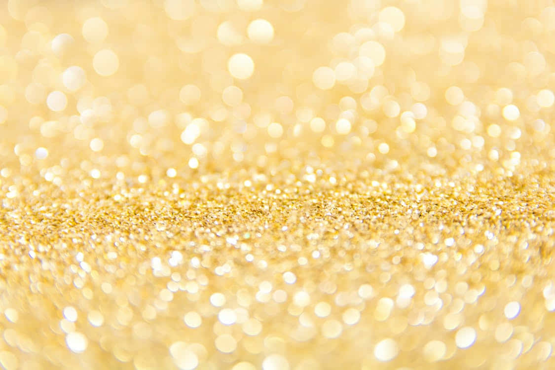 Yellow Glitter 桌布 壁紙 — 閃爍金色亮片的特寫，搭配散景光效，營造出奢華喜慶的背景。