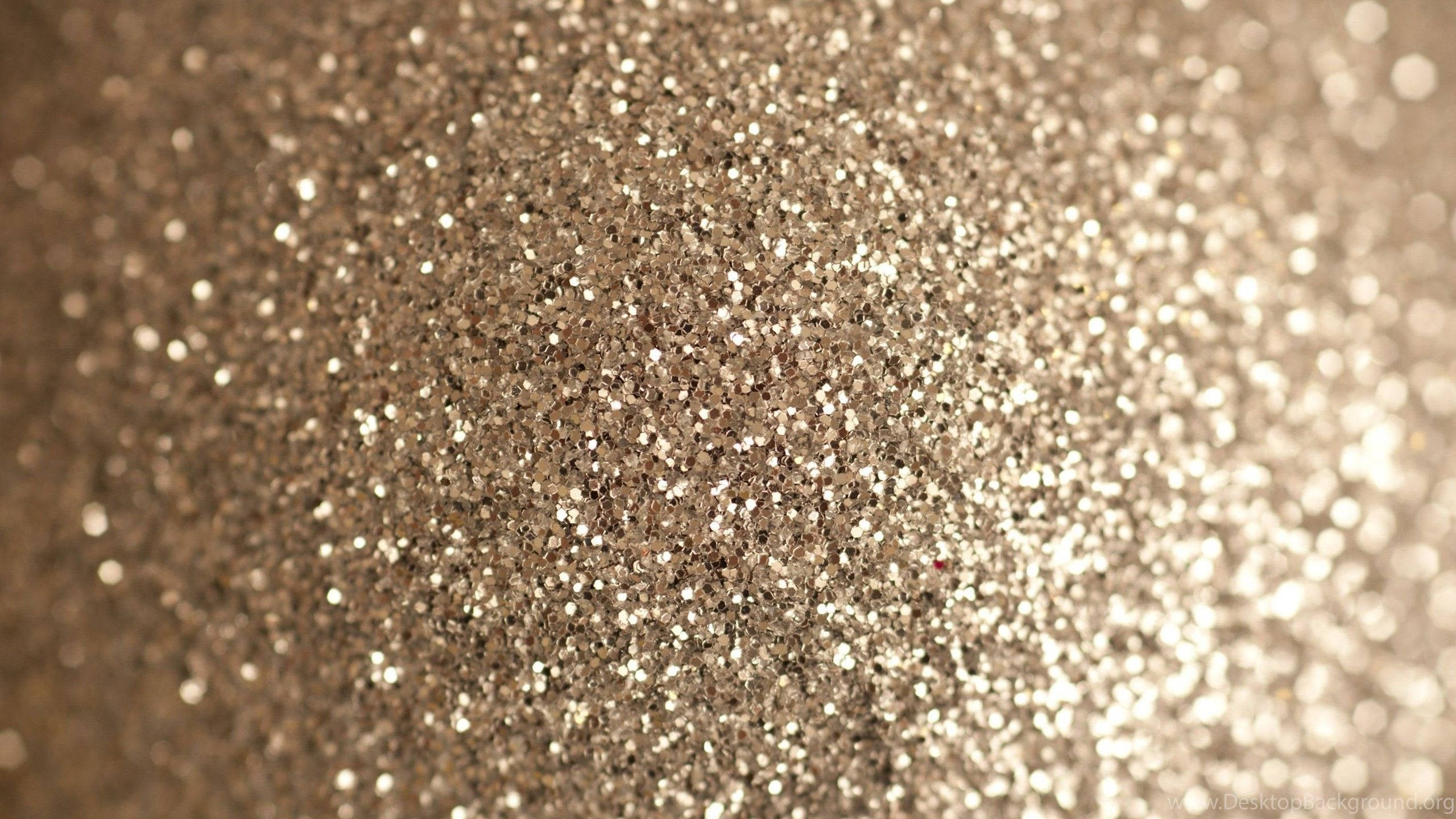 Sparkly 桌布 壁紙 — 閃爍金色亮粉的特寫，帶有散景高光，營造出奢華閃亮的質感。