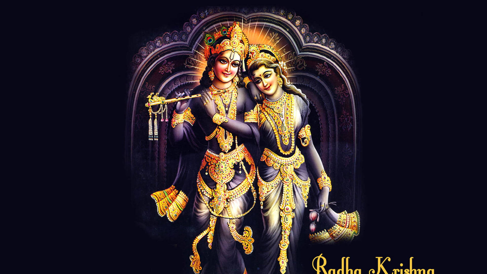 Shri Krishna 桌布 壁紙 — 閃耀的神聖人物拉達和克里希納，飾以精緻的金色珠寶，在黑暗背景下於發光的拱門下擁抱。