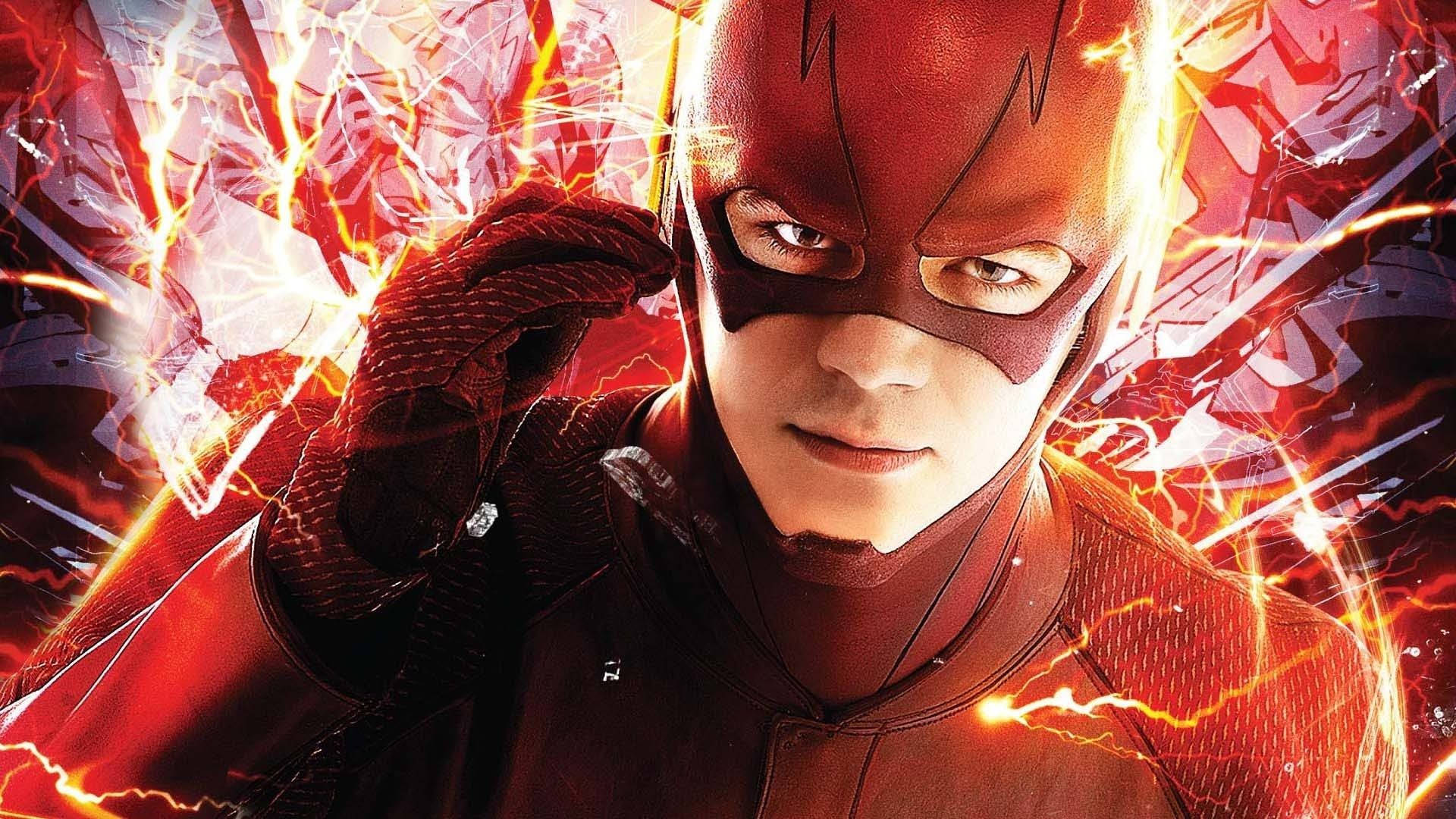 the flash 4K 桌布 壁紙 — 閃電俠身穿紅色戰衣，被電光及碎玻璃包圍，表情專注而強烈。