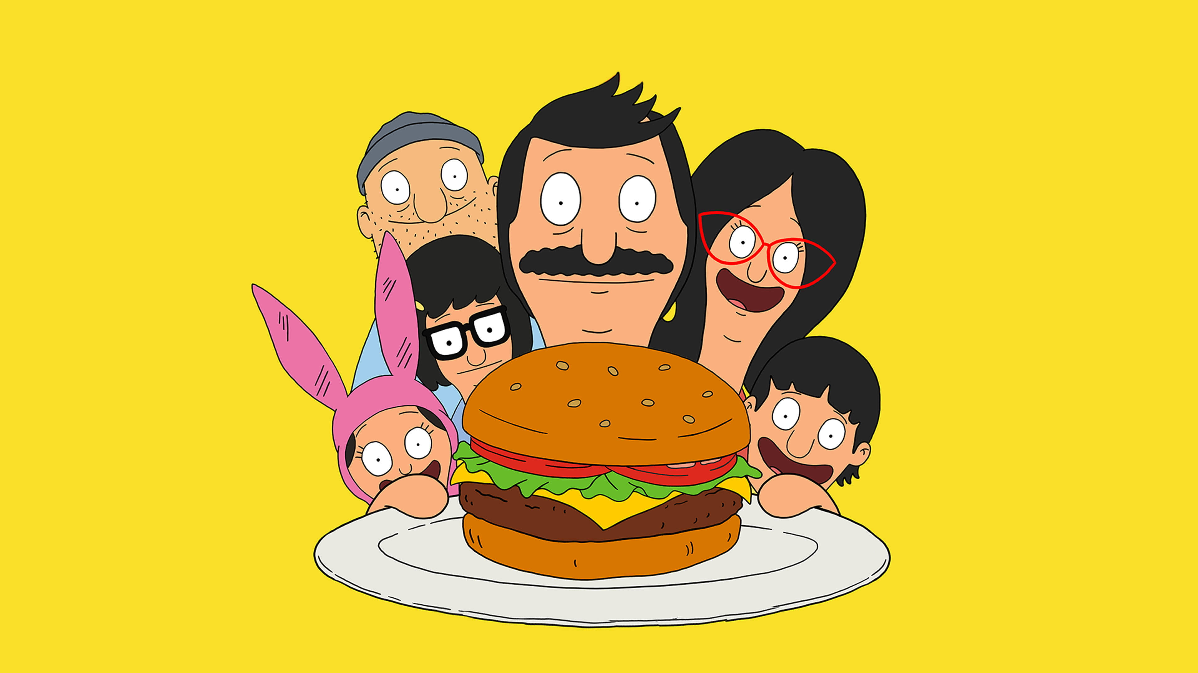 Cheeseburger 桌布 壁紙 — 《開心漢堡店》家庭圍著一個放在盤子上的巨型漢堡，背景是明亮的黃色。