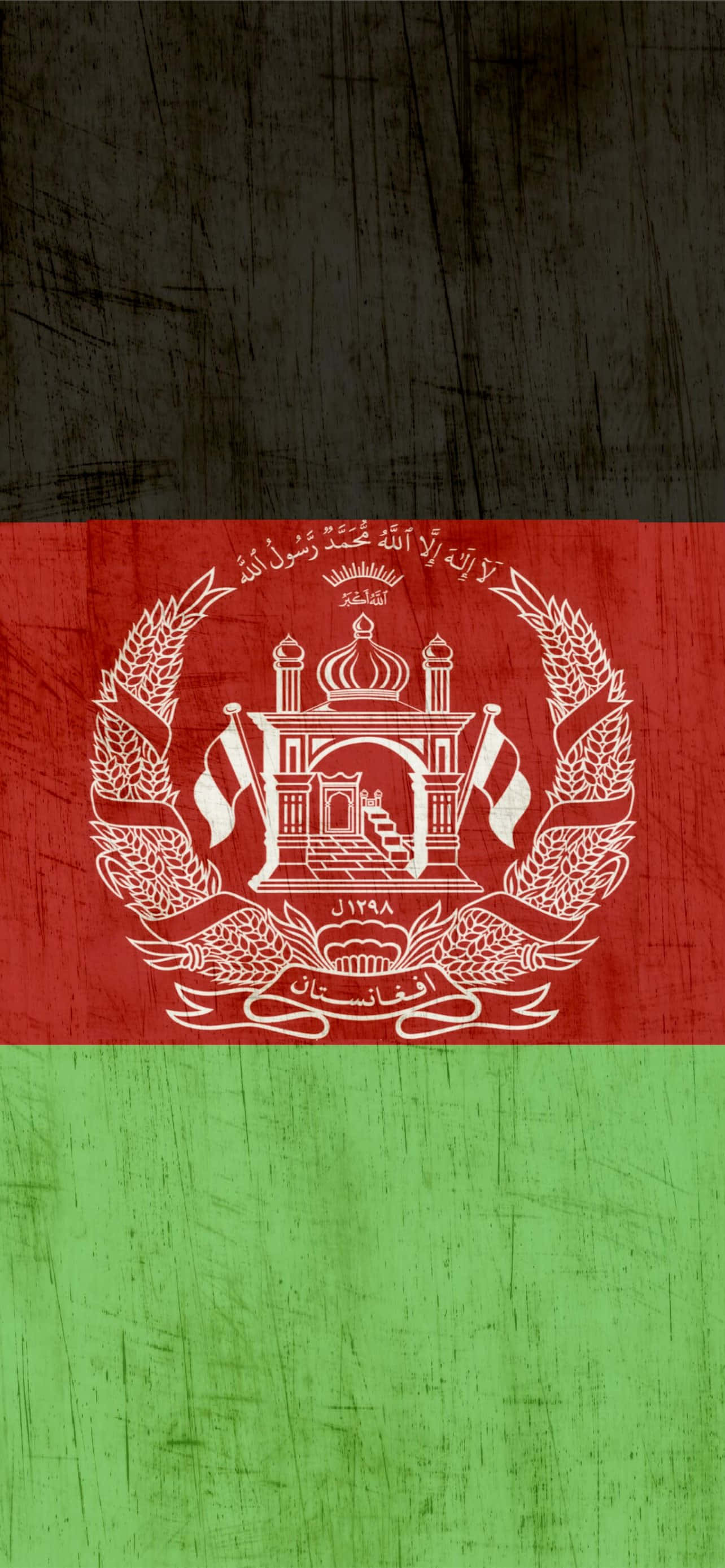 Afghanistan 桌布 壁紙 — 阿富汗國旗，中央紅色，底部綠色，置於紋理深色背景上。