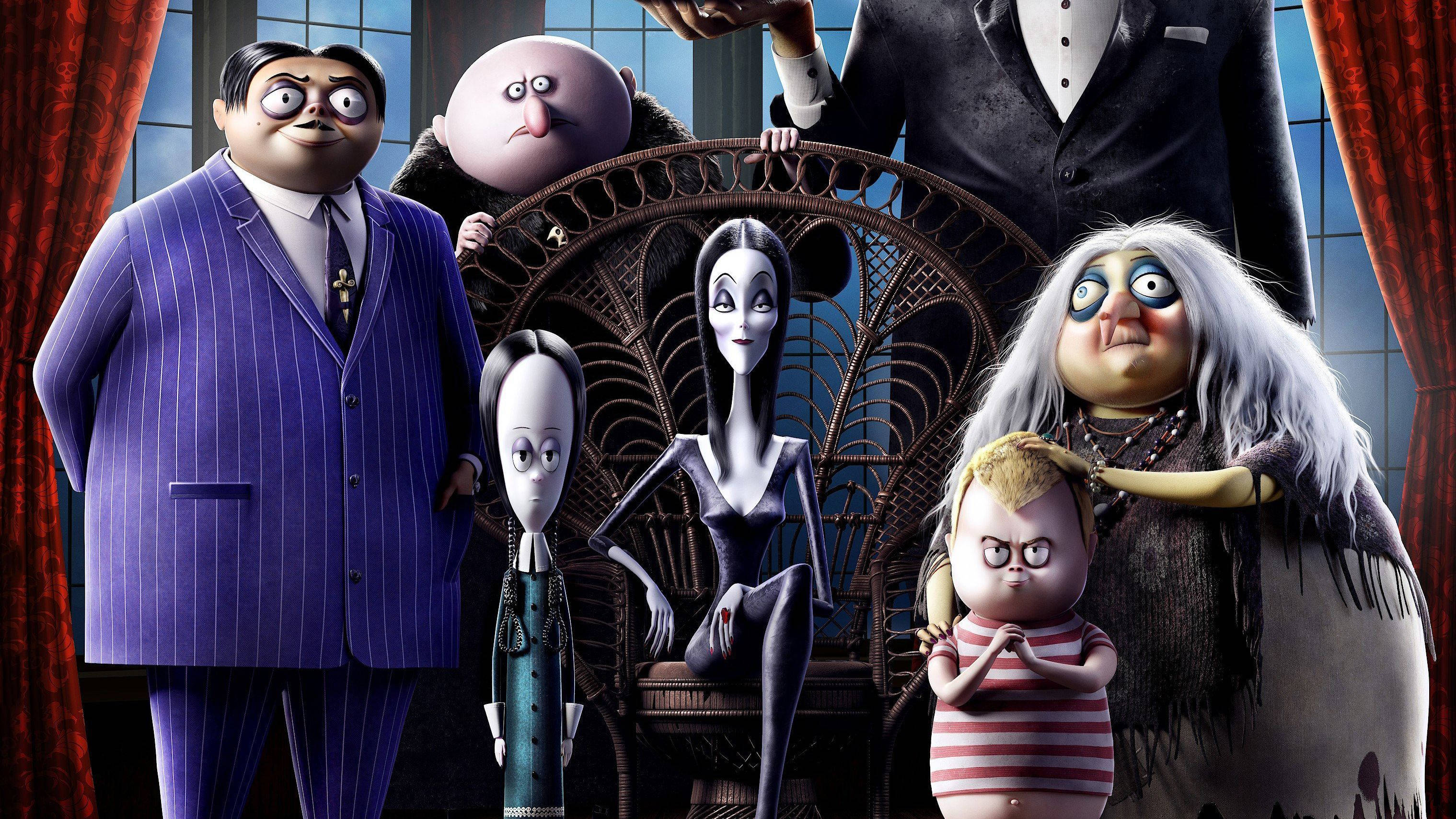 The Addams Family 2 桌布 壁紙 — 阿達一族聚集在一座哥德式大宅中，表情詭異，搭配復古家具。