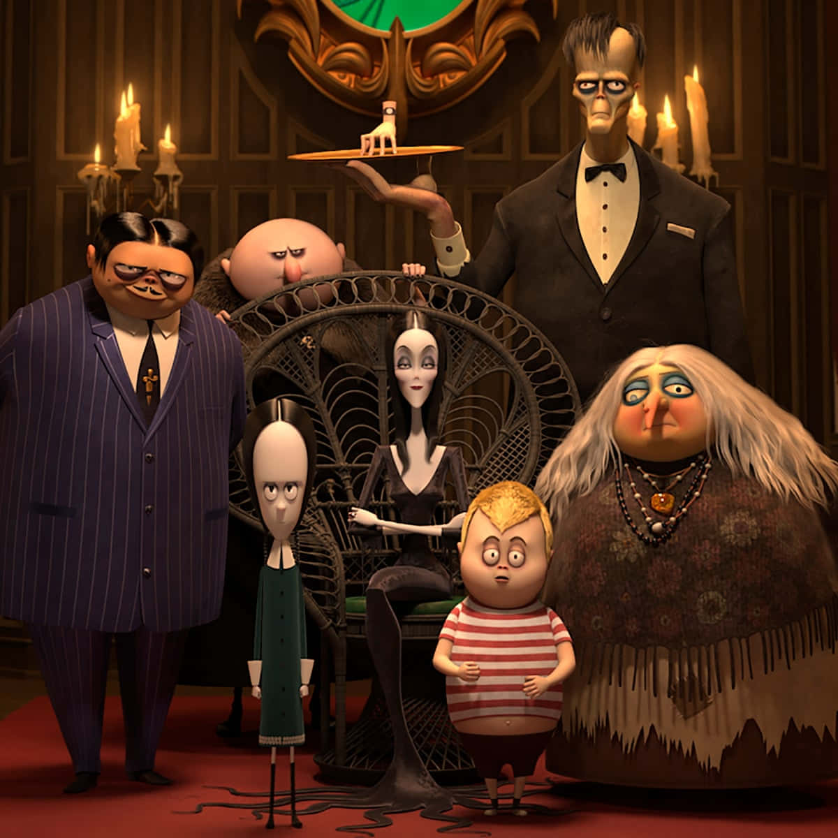 Addams Family 桌布 壁紙 — 阿達一族聚集在他們的哥德式大宅中，牆上燭光閃爍，散發詭異優雅。