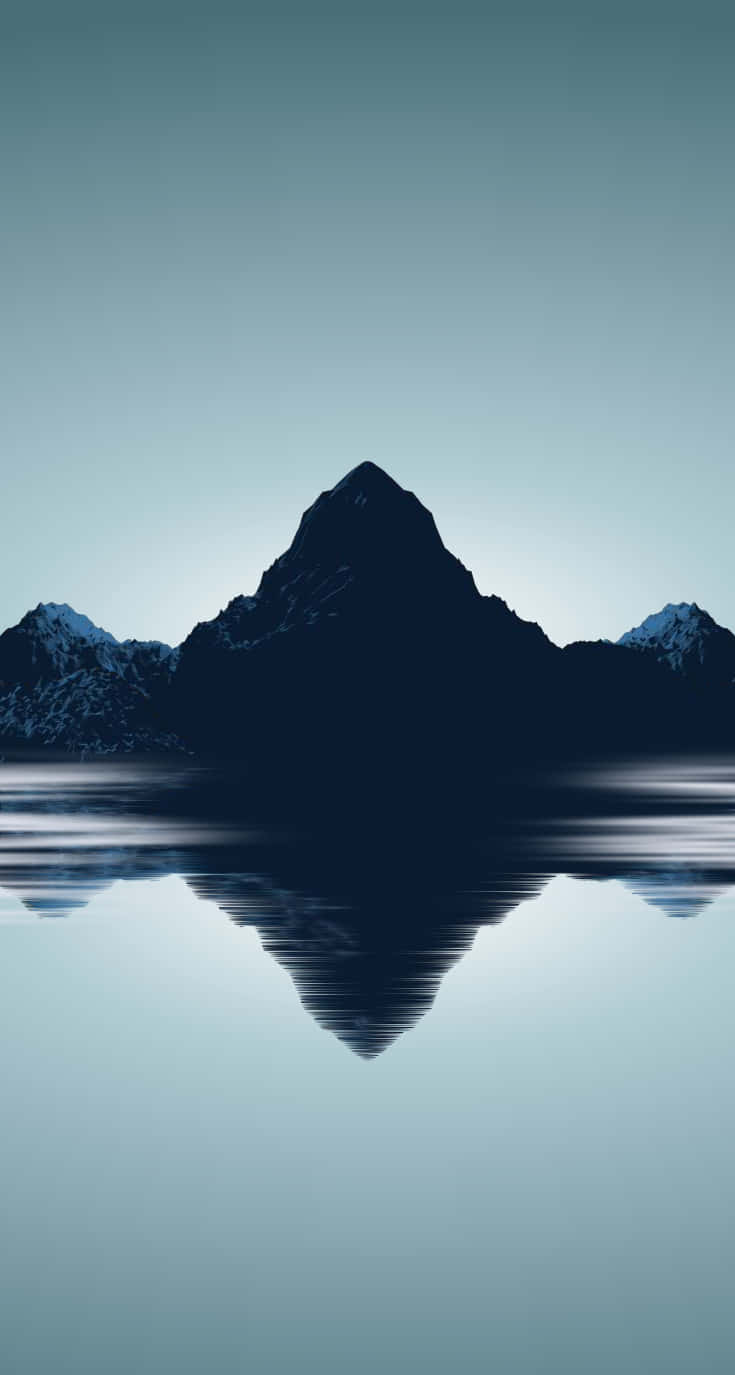 reflection 桌布 壁紙 — 陡峭的山峰及其完美的倒影在漸變天空下的平靜水域中閃爍。