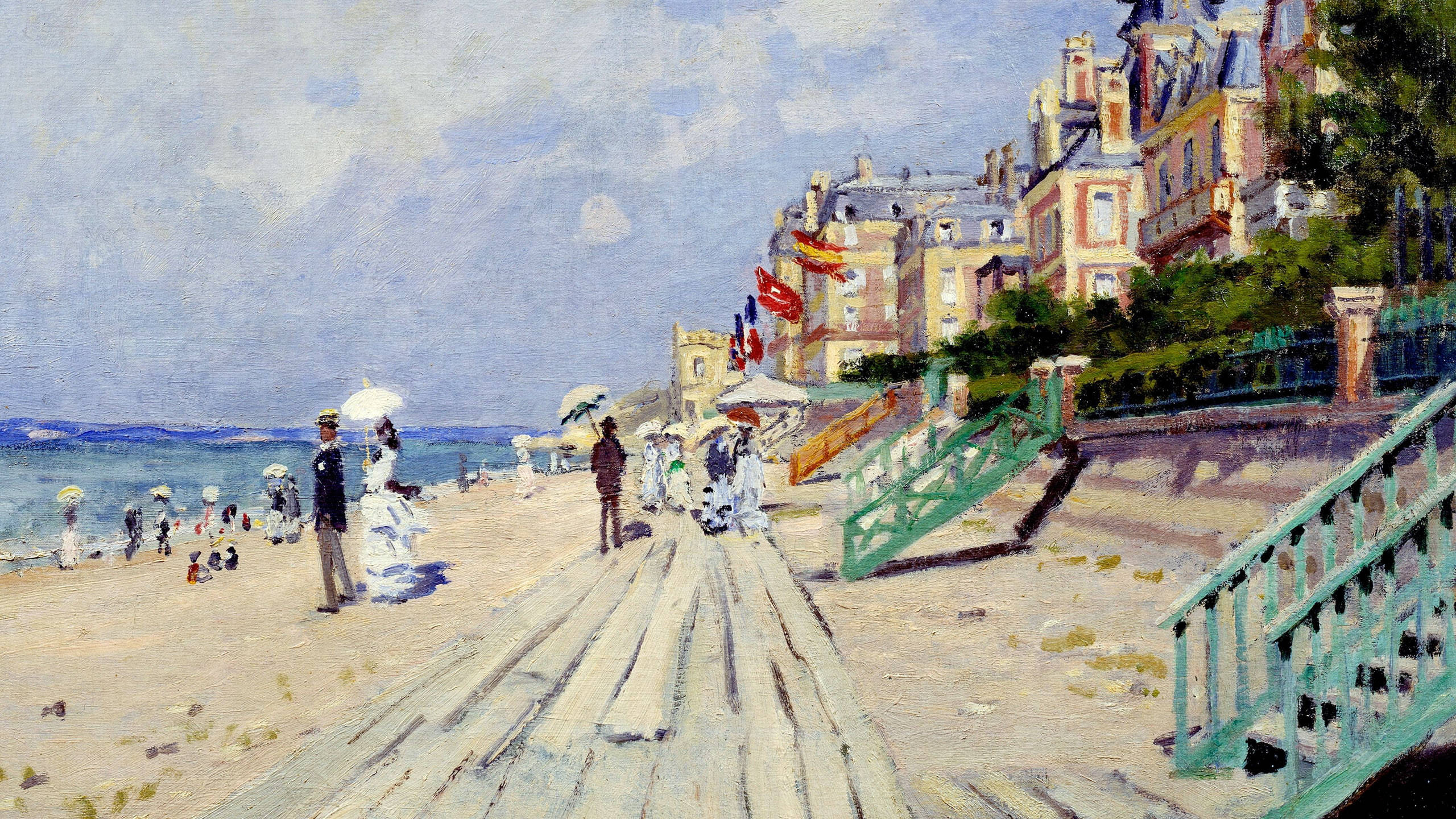 Monet 桌布 壁紙 — 陽光普照的海灘場景，人們在明亮的藍天下沿著木製木板路漫步，旁邊是粉彩色的建築物。