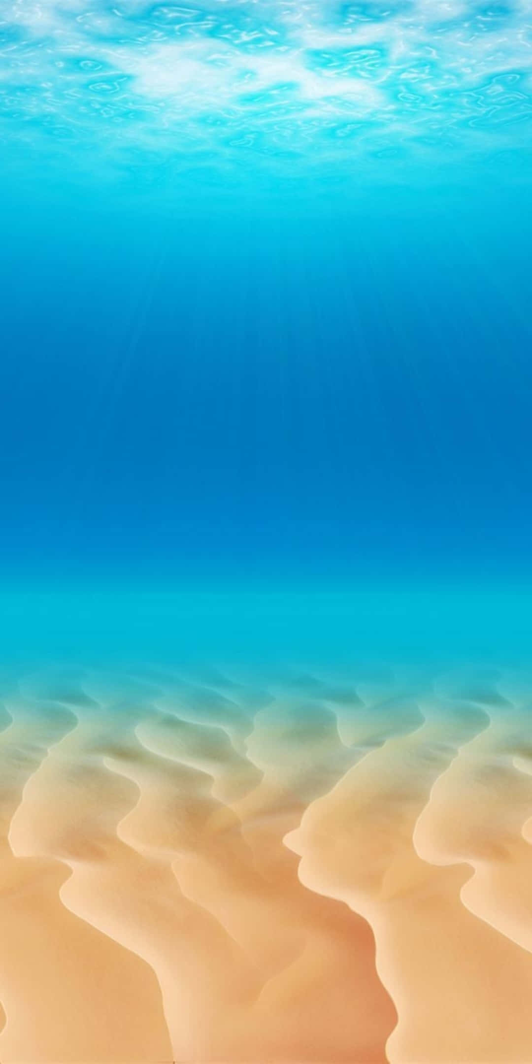 Pixel 3 Beach 桌布 壁紙 — 陽光穿過清澈的碧綠色海水，照亮下方波紋狀的金色沙地。