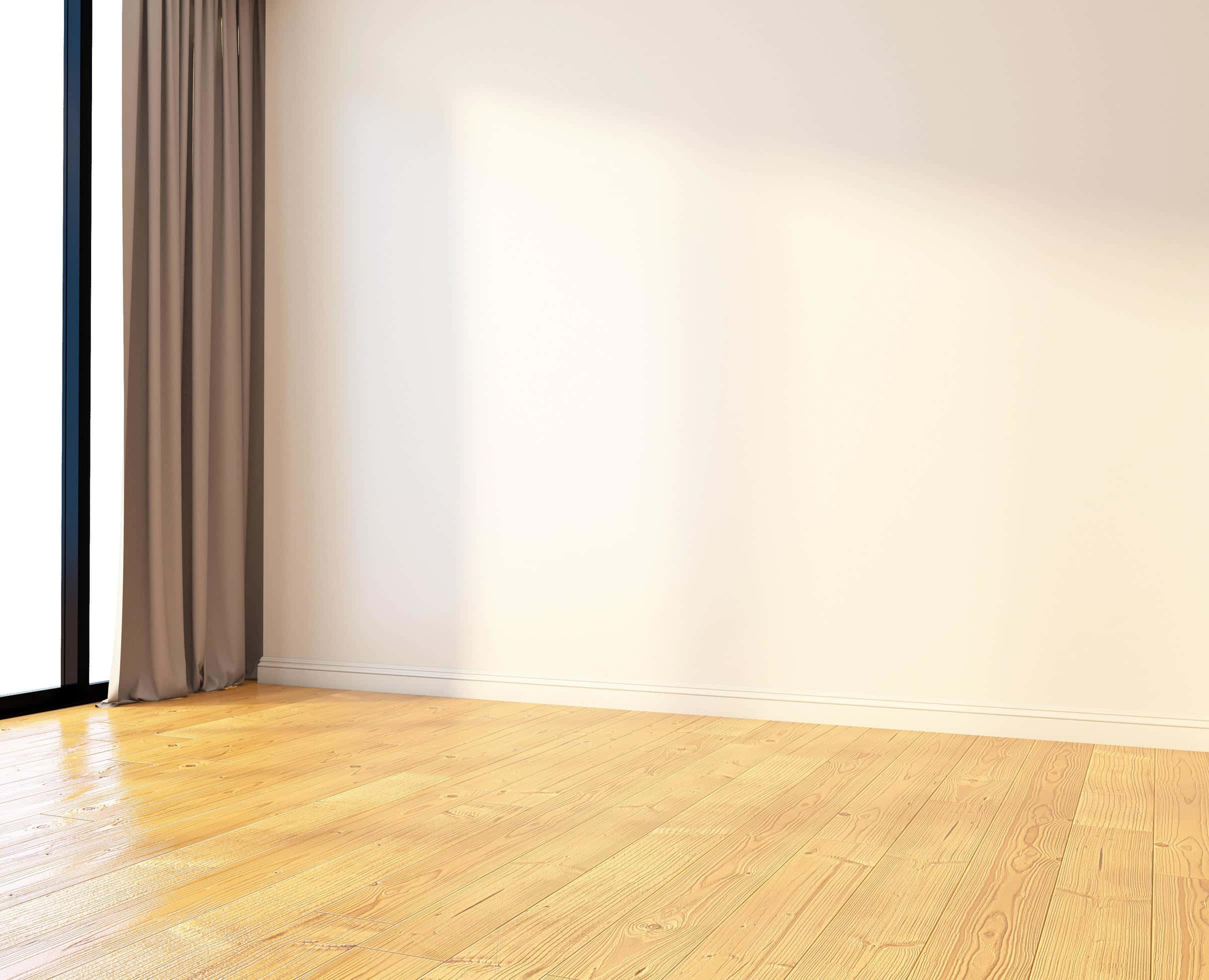 Empty Room 桌布 壁紙 — 陽光穿過高窗，在米色窗簾旁的淺色木地板上投下柔和陰影。