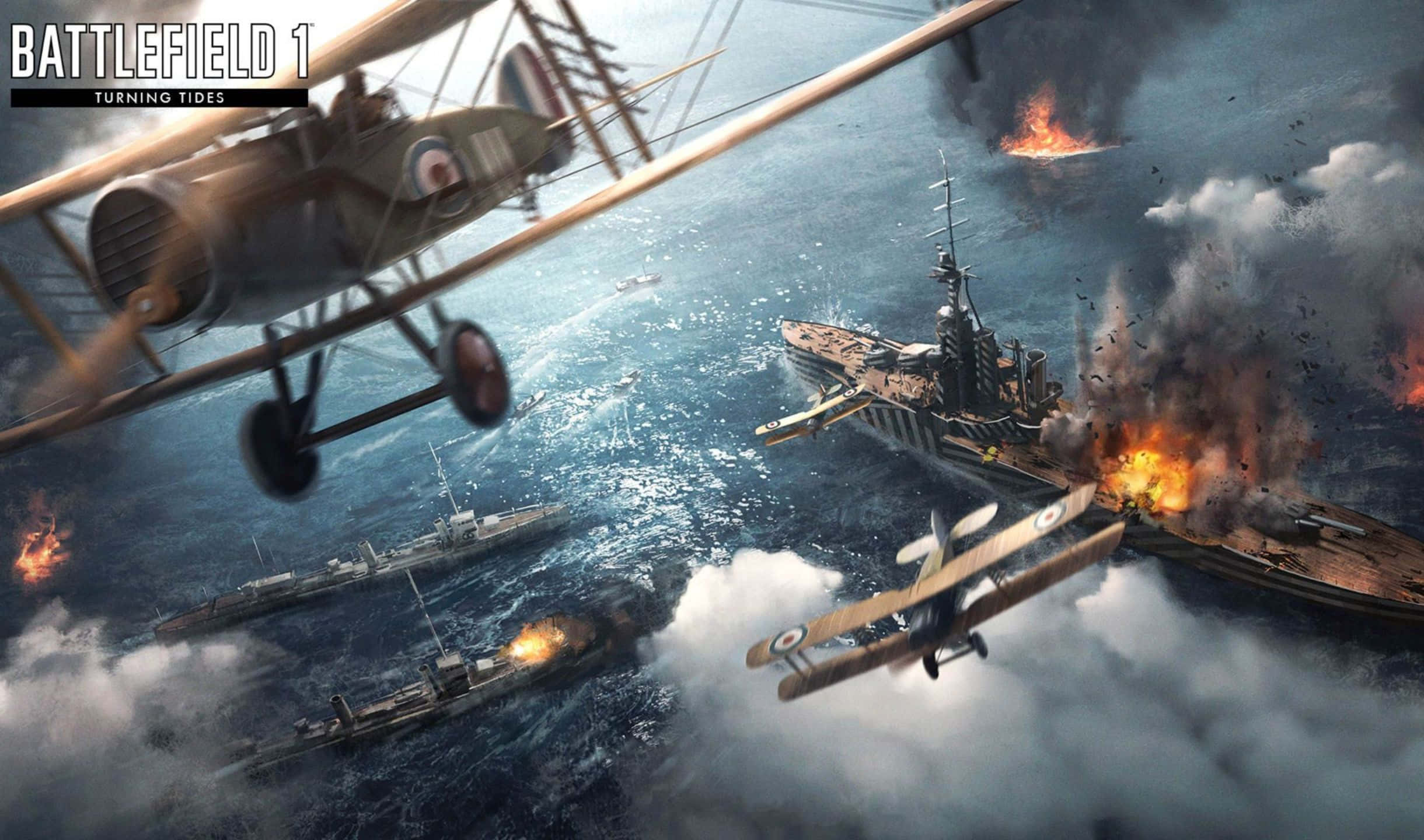 2440x1440 Battlefield 1 桌布 壁紙 — 雙翼飛機在燃燒的軍艦上空盤旋，煙霧和火焰在翻騰的海面上爆發，形成混亂的海戰。