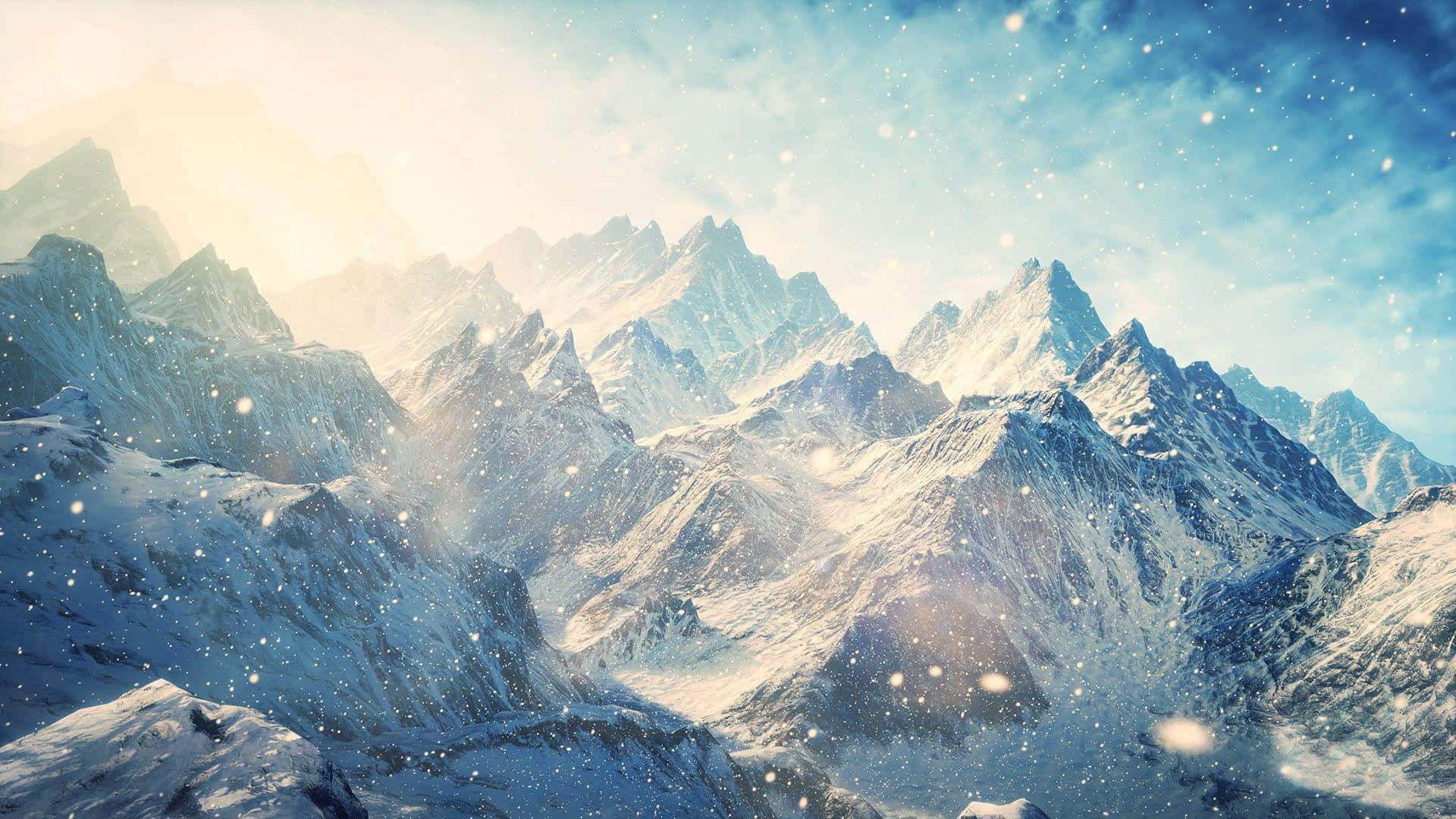 Snowy Mountain 桌布 壁紙 — 雪花在明亮的天空中飄蕩，飄過沐浴在柔和晨光中的鋸齒狀積雪山峰。