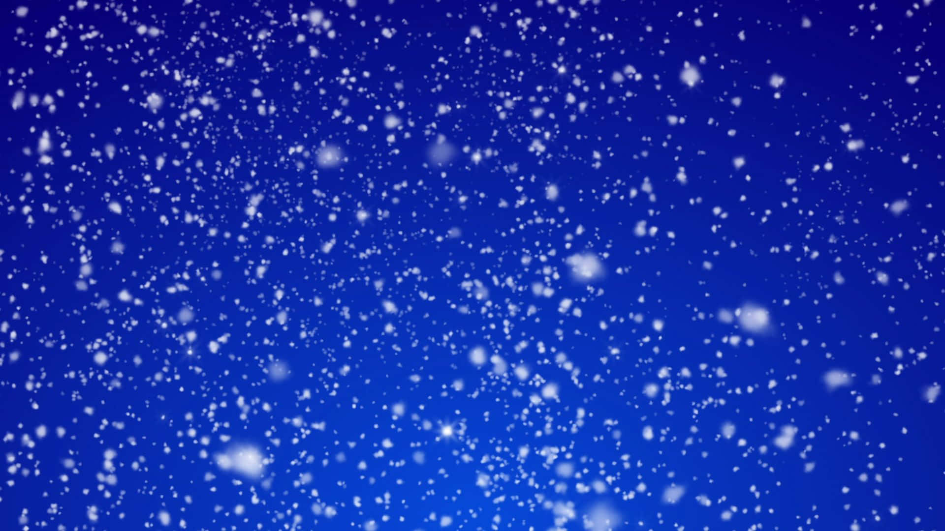Snowing 桌布 壁紙 — 雪花在深藍色夜空下輕輕飄落，構成寧靜的冬日場景。