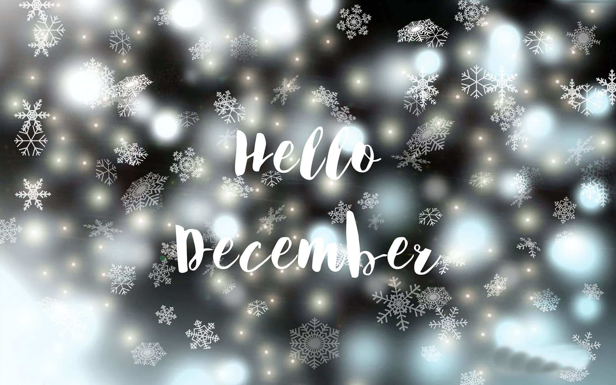 Hello December 桌布 壁紙 — 雪花在發光的散景燈光中飄舞，優雅的白色草書文字寫著哈囉十二月。