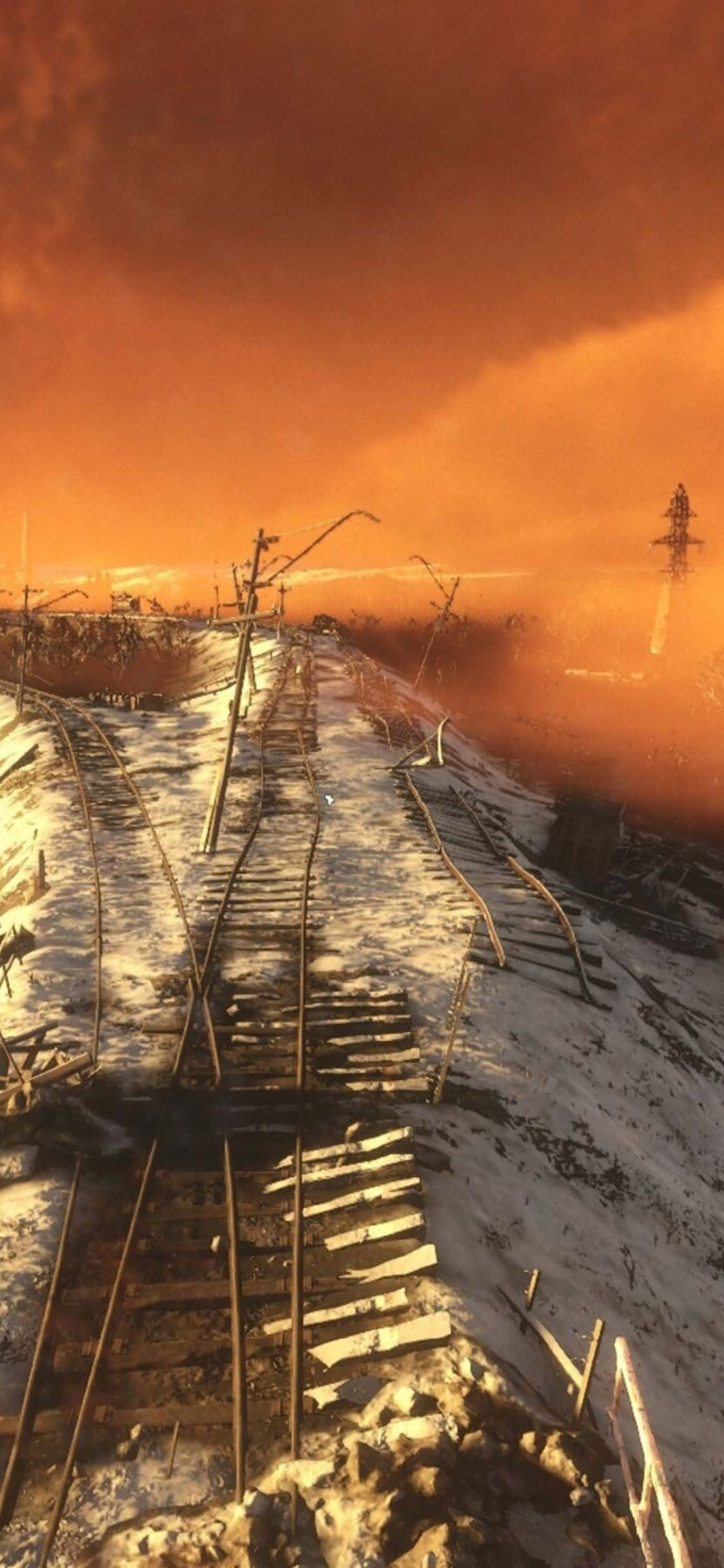 iPhone X Metro Exodus 桌布 壁紙 — 雪覆蓋著破損的鐵路軌道，在戲劇性的冬季日落時分，天空呈現火橙色。