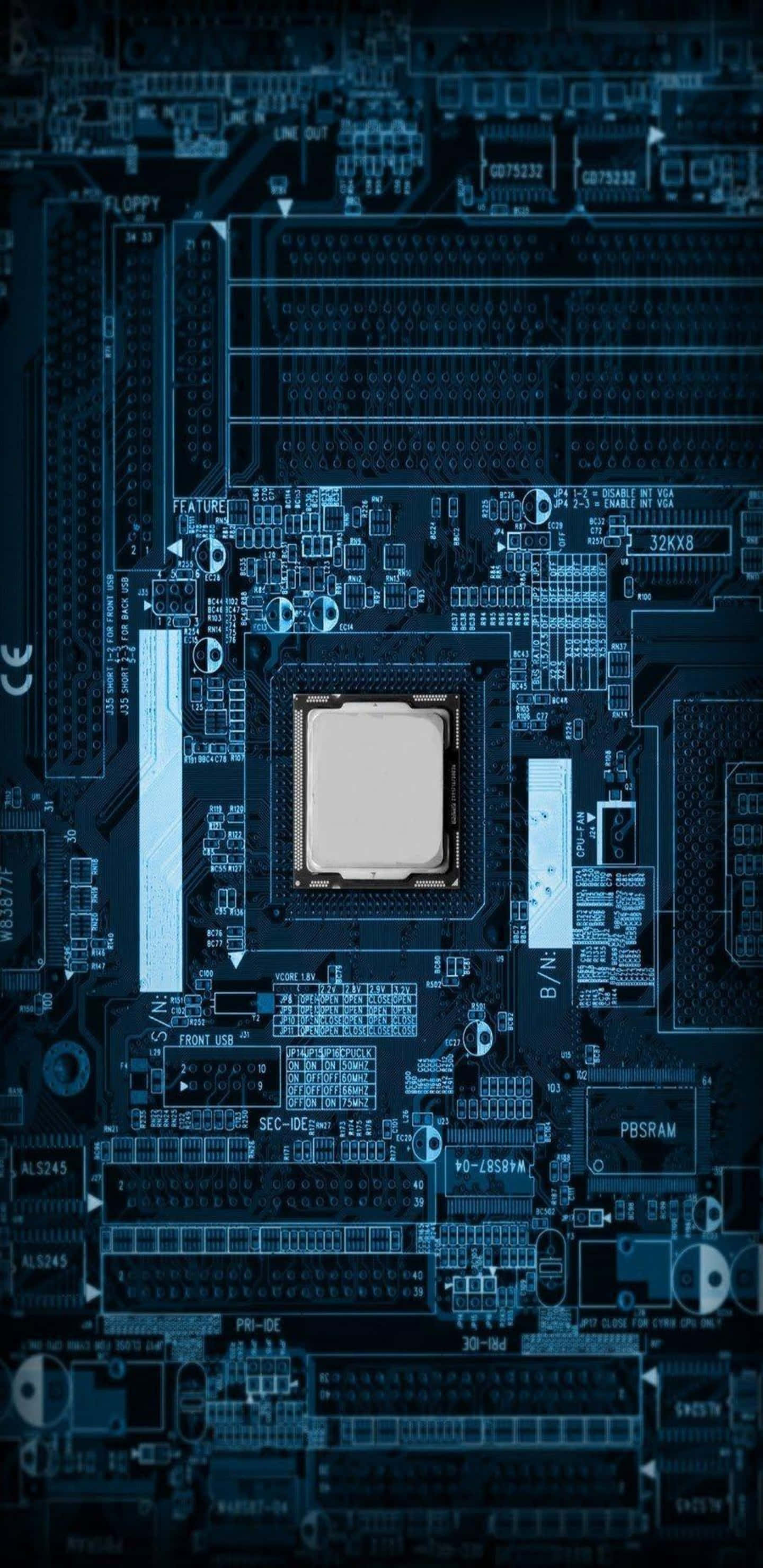 Motherboard 桌布 壁紙 — 電腦主機板特寫，中央CPU插槽在藍光下發光。