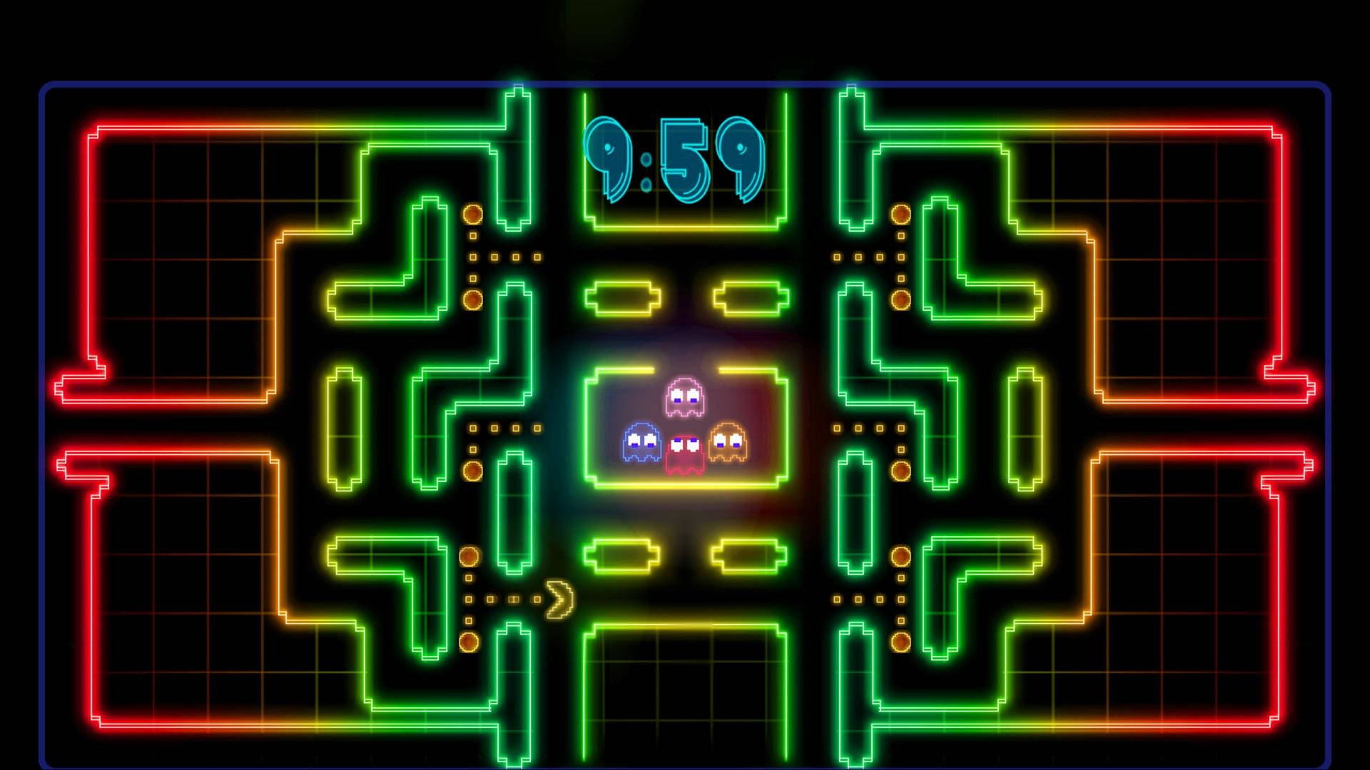 電玩遊戲 桌布 壁紙 — 霓虹燈照亮的 Pac-Man 迷宮在黑色背景上閃爍著鮮豔的紅色、綠色和黃色線條，並有鬼魂角色和數位計時器。