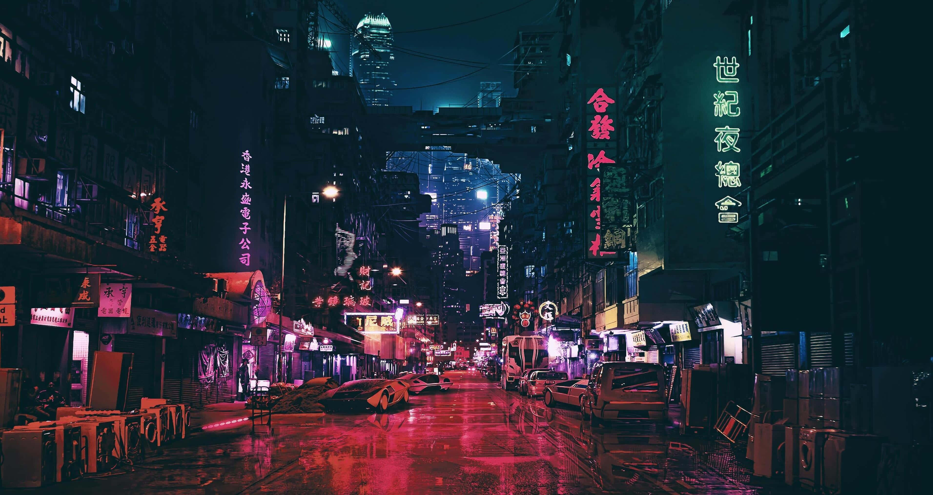 霓虹燈與招牌點綴的城市街道 壁紙
