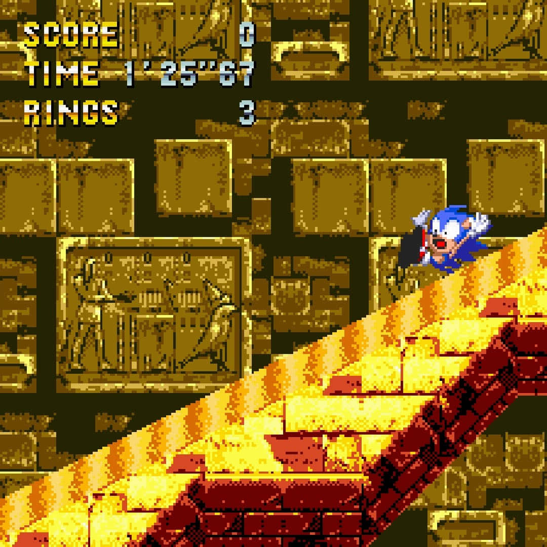 Sonic Sandopolis Zone 桌布 壁紙 — 音速小子在經典16位元電子遊戲中跑過一個金色金字塔主題關卡。