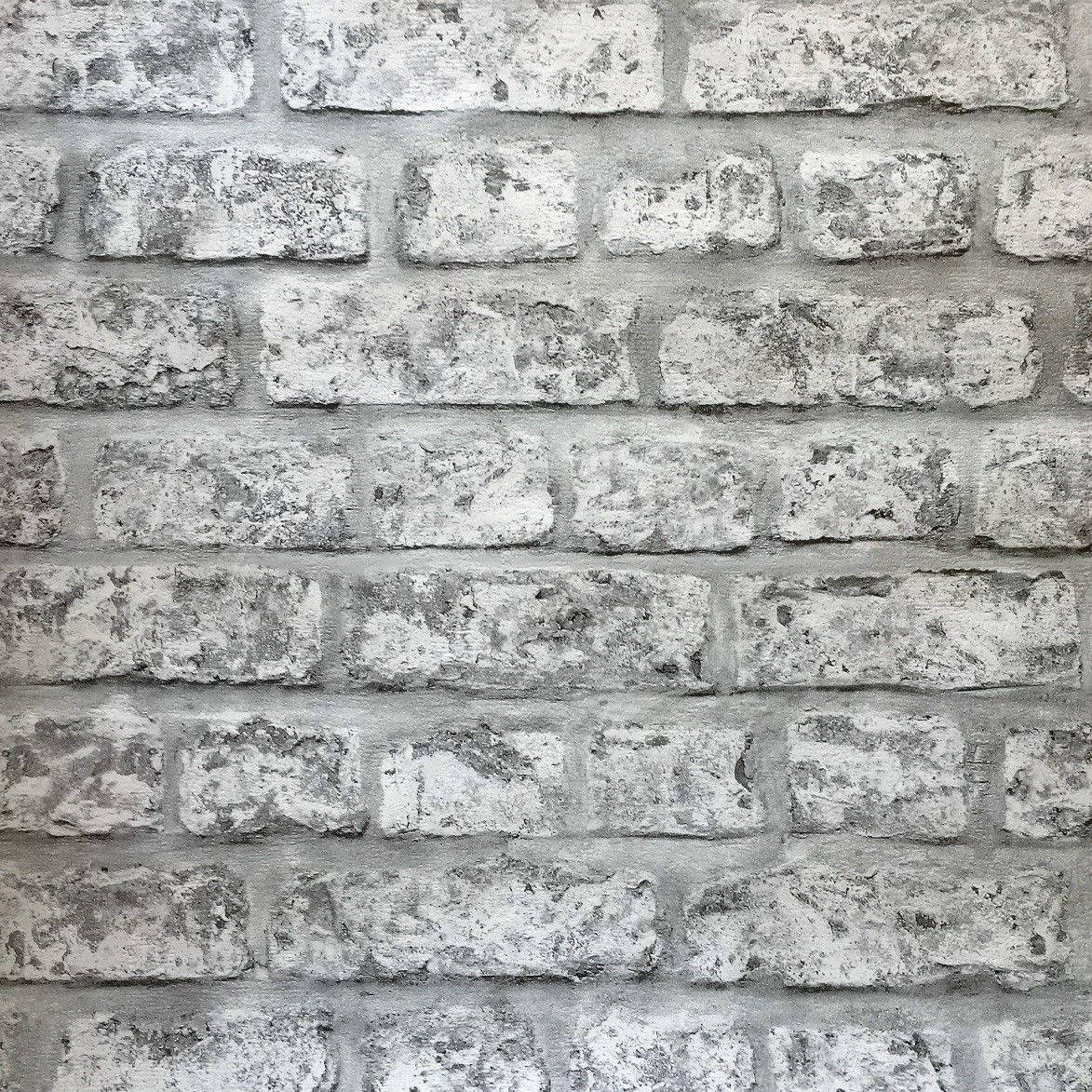Brick 桌布 壁紙 — 風化白色磚塊與灰色砂漿的特寫，形成有紋理的都市牆面。