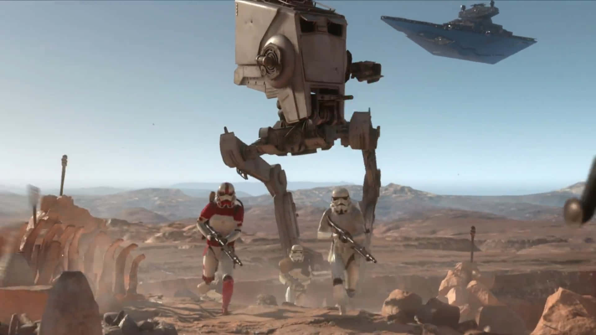Tatooine 桌布 壁紙 — 風暴兵和AT-AT步行機在晴朗藍天下，於荒蕪沙漠星球上前進，上空有滅星者飛船飛過。