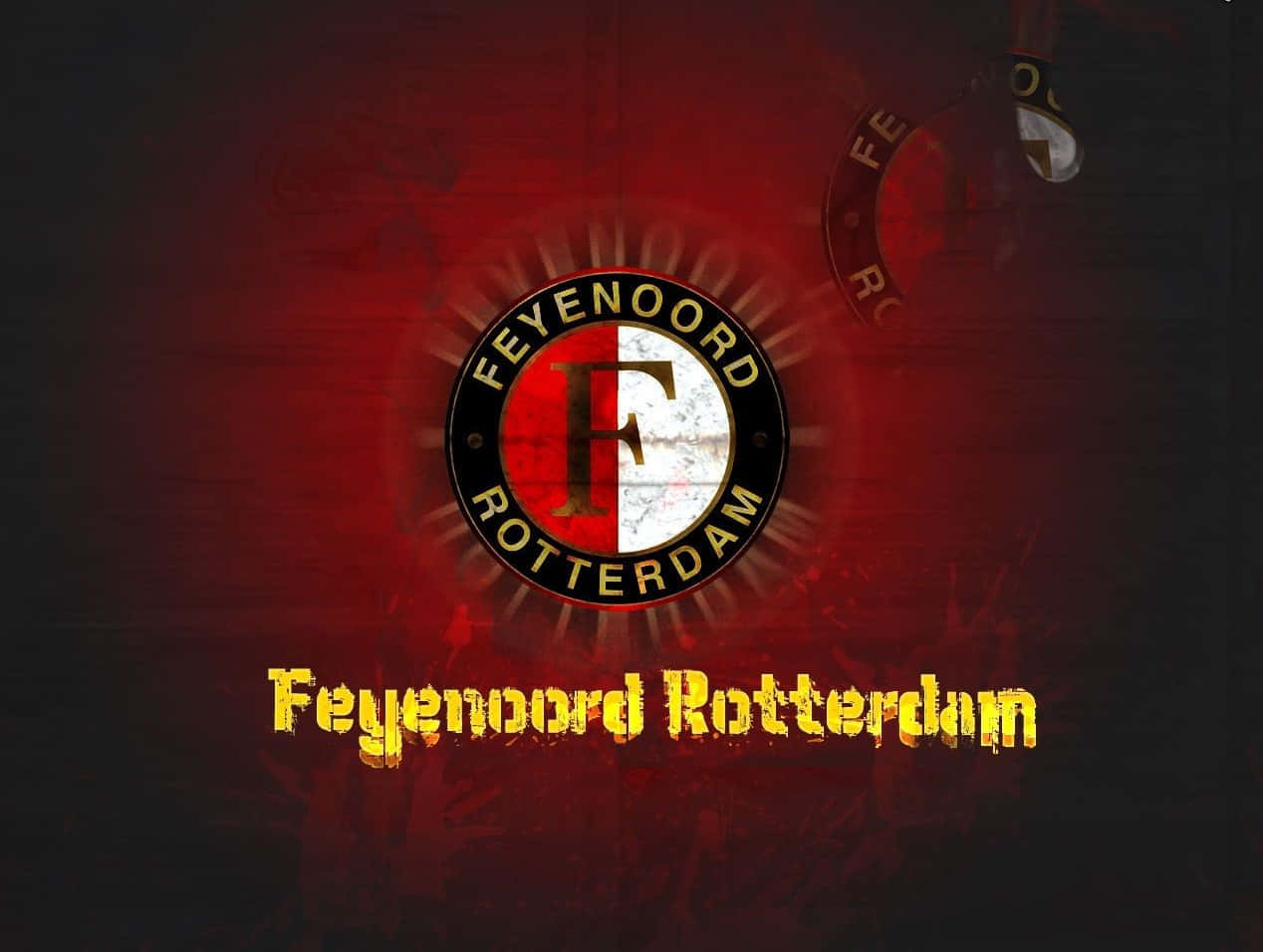 Feyenoord 桌布 壁紙 — 飛燕諾鹿特丹標誌在深色紋理背景上以鮮明的紅白色發光，下方有火黃色文字。