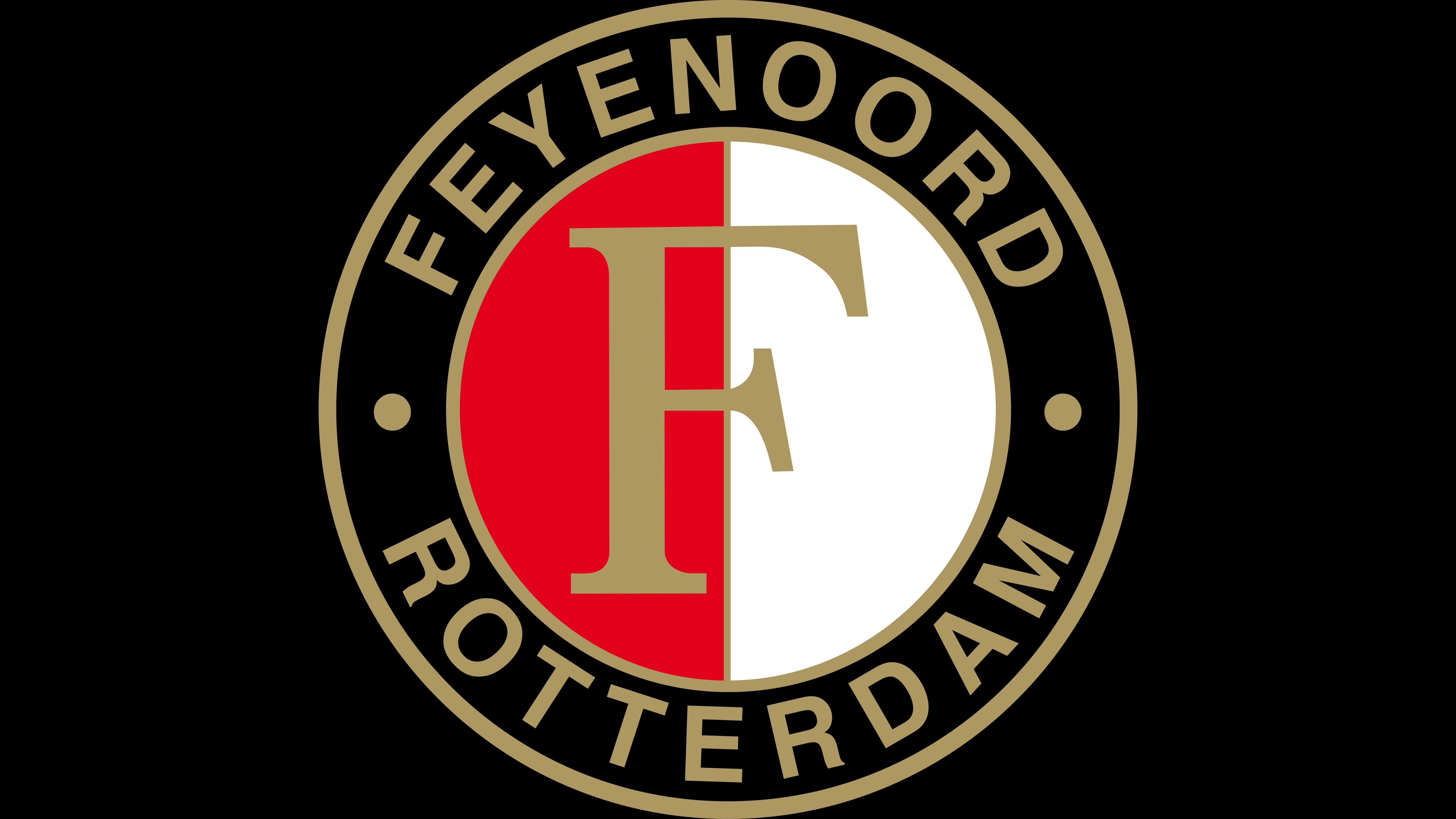 Feyenoord 桌布 壁紙 — 飛燕諾鹿特丹足球俱樂部標誌，黑色背景上帶有粗體紅白金色圓形徽章。