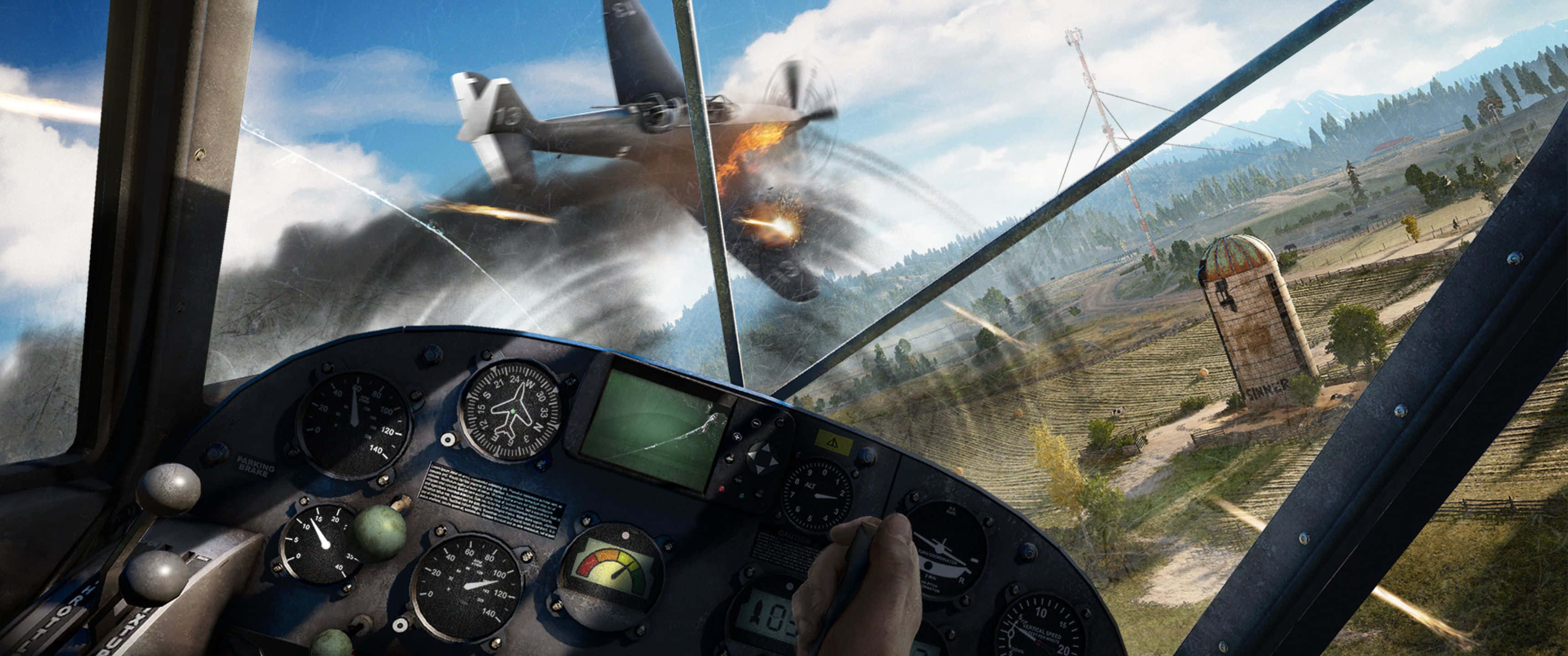 3440x1440p Far Cry 5 桌布 壁紙 — 飛行員在鄉村景觀上空與敵機進行空中纏鬥時，從駕駛艙看到的燃燒敵機視角。