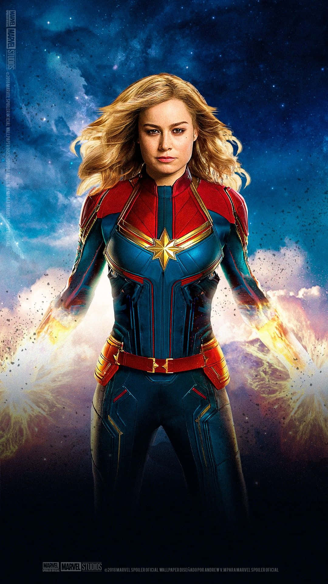 Super Hero 桌布 壁紙 — 驚奇隊長以英雄姿態站在宇宙背景下，雙手散發出發光的能量爆發。