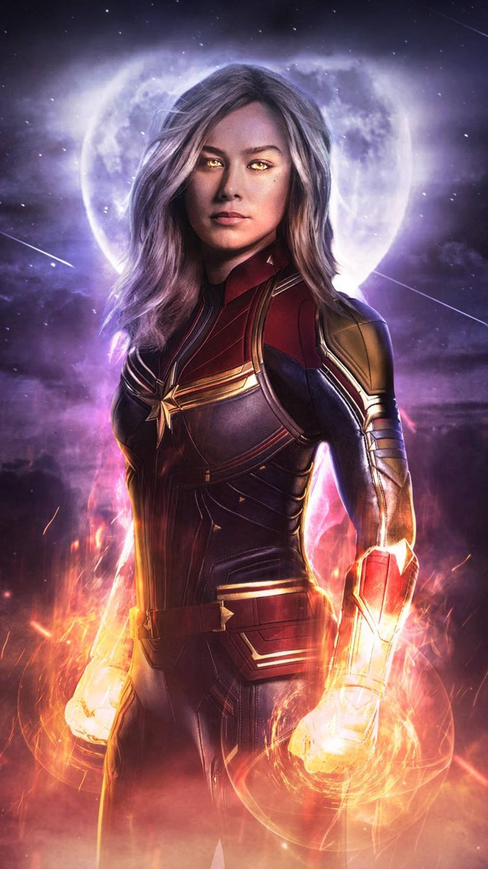 captain marvel iPhone 桌布 壁紙 — 驚奇隊長在宇宙背景下強勢站立，周圍有發光的月亮和在她拳頭周圍旋轉的熾熱能量。