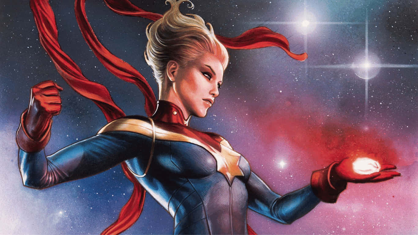 Hero 桌布 壁紙 — 驚奇隊長英勇地站在太空中，手持發光球體，紅色斗篷在繁星宇宙背景下飄揚。
