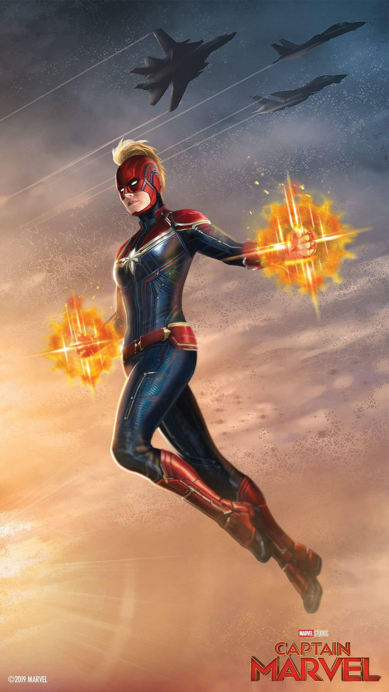 captain marvel iPhone 桌布 壁紙 — 驚奇隊長飛過多雲的天空，發射能量爆炸，身後有戰鬥機尾隨。