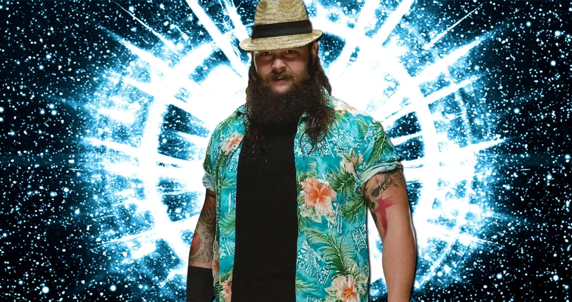 WWE 桌布 壁紙 — 鬍鬚男戴草帽穿花襯衫，站在宇宙藍色星爆背景前。