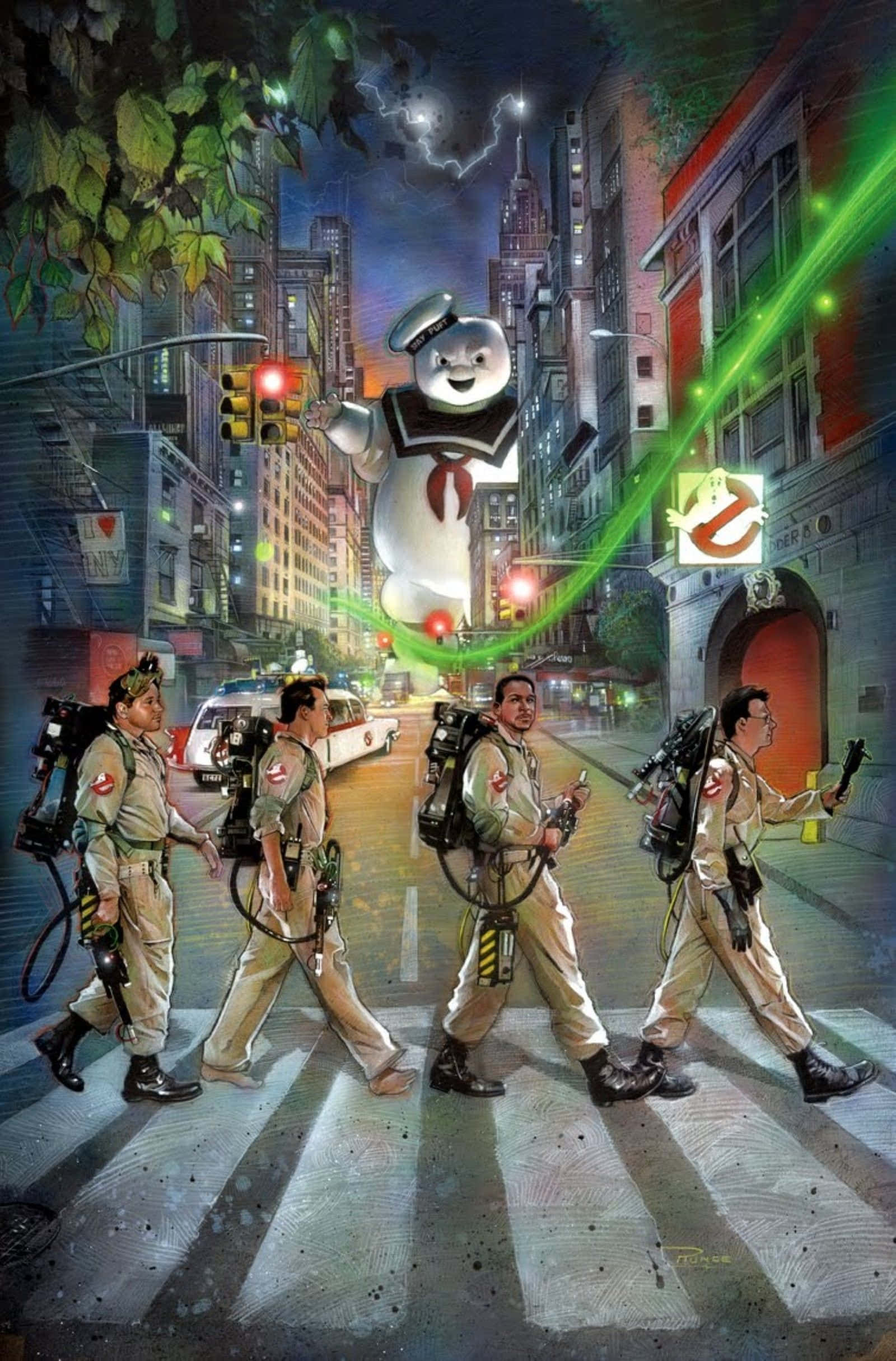 魔鬼剋星 桌布 壁紙 — 魔鬼剋星在夜間穿越城市街道，而巨大的Stay Puft棉花糖人從上空發射綠色雷射。