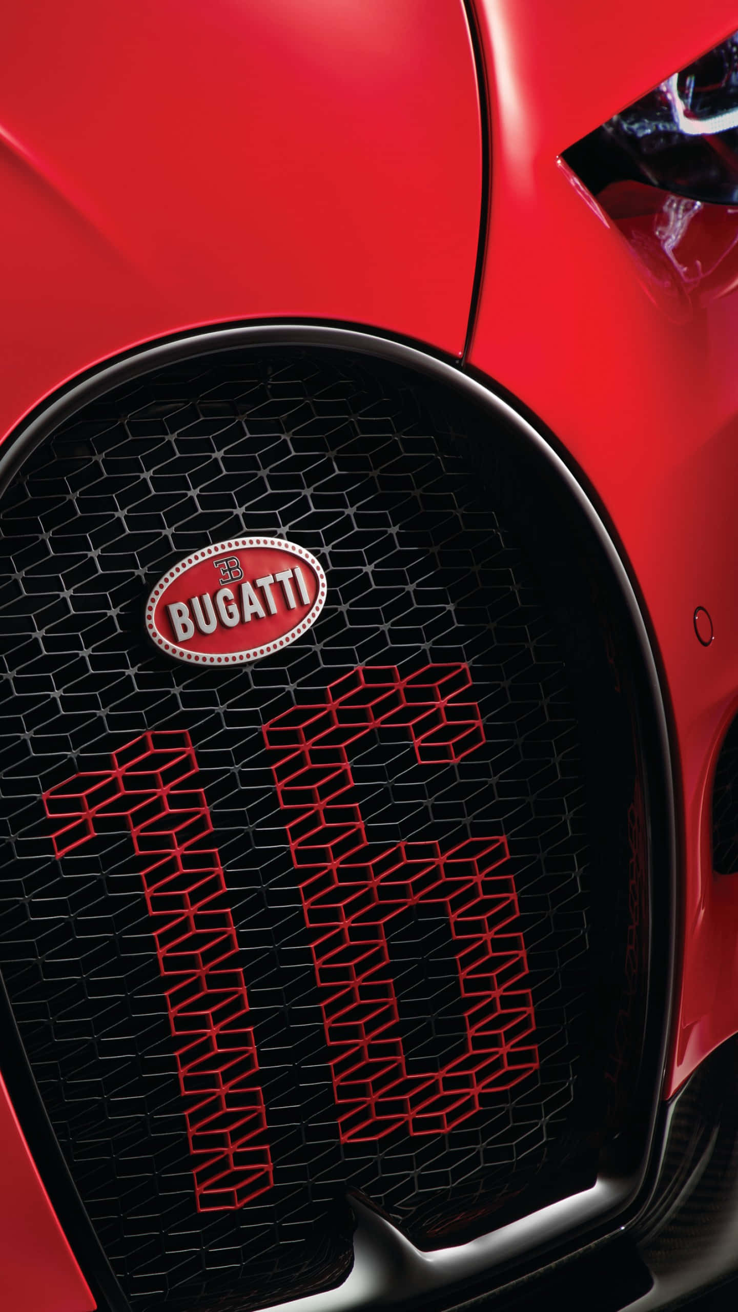 Bugatti Phone 桌布 壁紙 — 鮮紅色布加迪汽車前格柵的特寫，黑色蜂窩圖案上帶有發光的紅色「16」和標誌性標誌。