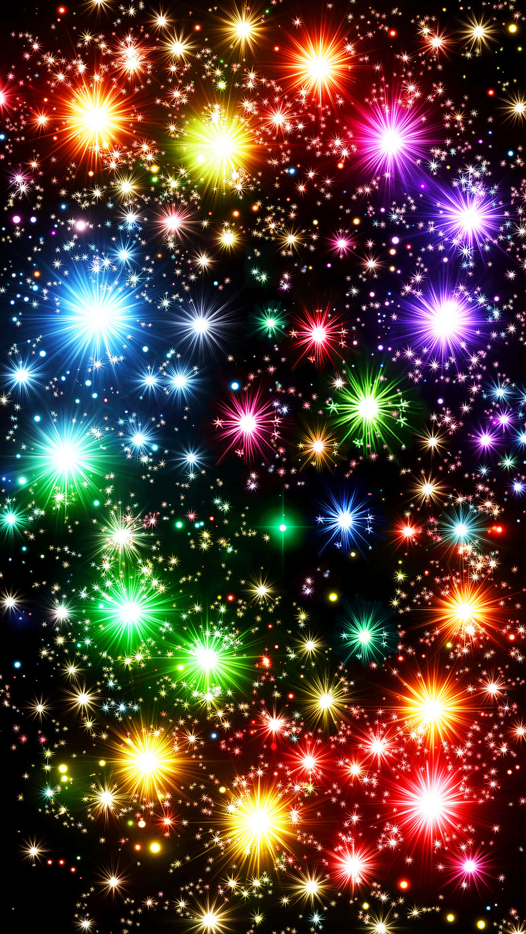 Christmas Wallpapers 壁紙 — 鮮豔多彩的星爆在深邃的黑色畫布上爆炸，創造出令人眼花繚亂的宇宙煙火表演。