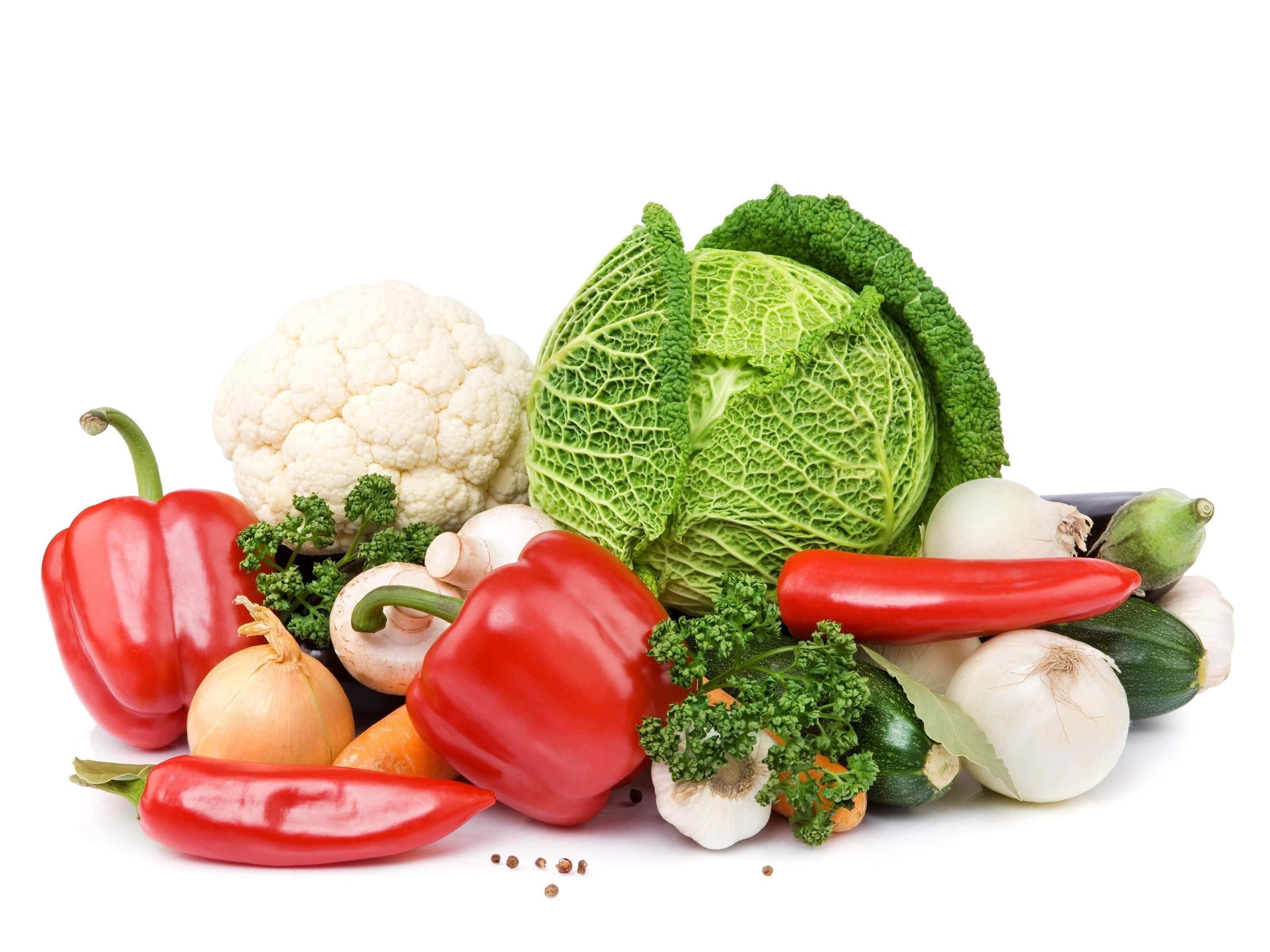 Vegetable 桌布 壁紙 — 鮮豔多樣的時令蔬菜，包括紅甜椒、花椰菜和高麗菜，整齊排列在潔白背景上。