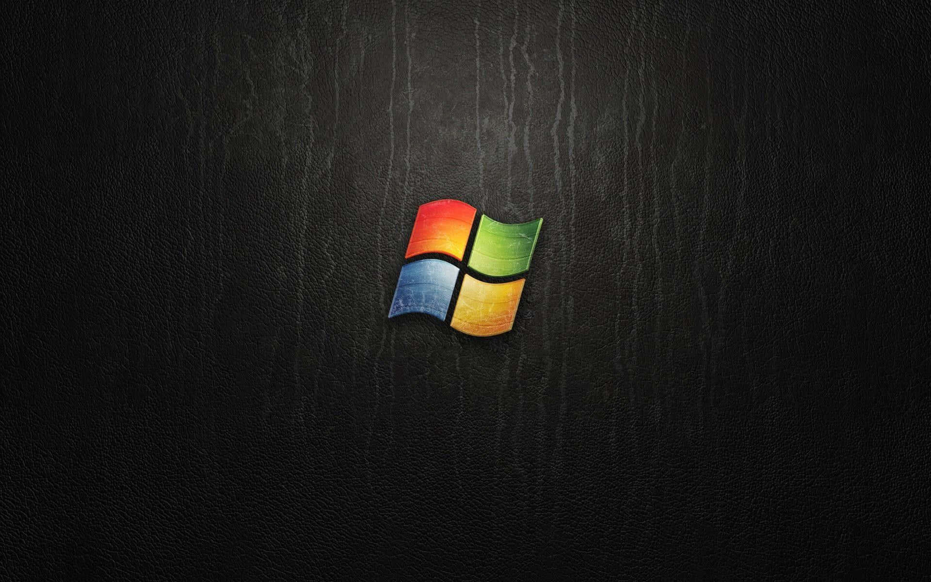 黑色皮革紋理上的Windows標誌 — Windows Vista 動態圖片 壁紙